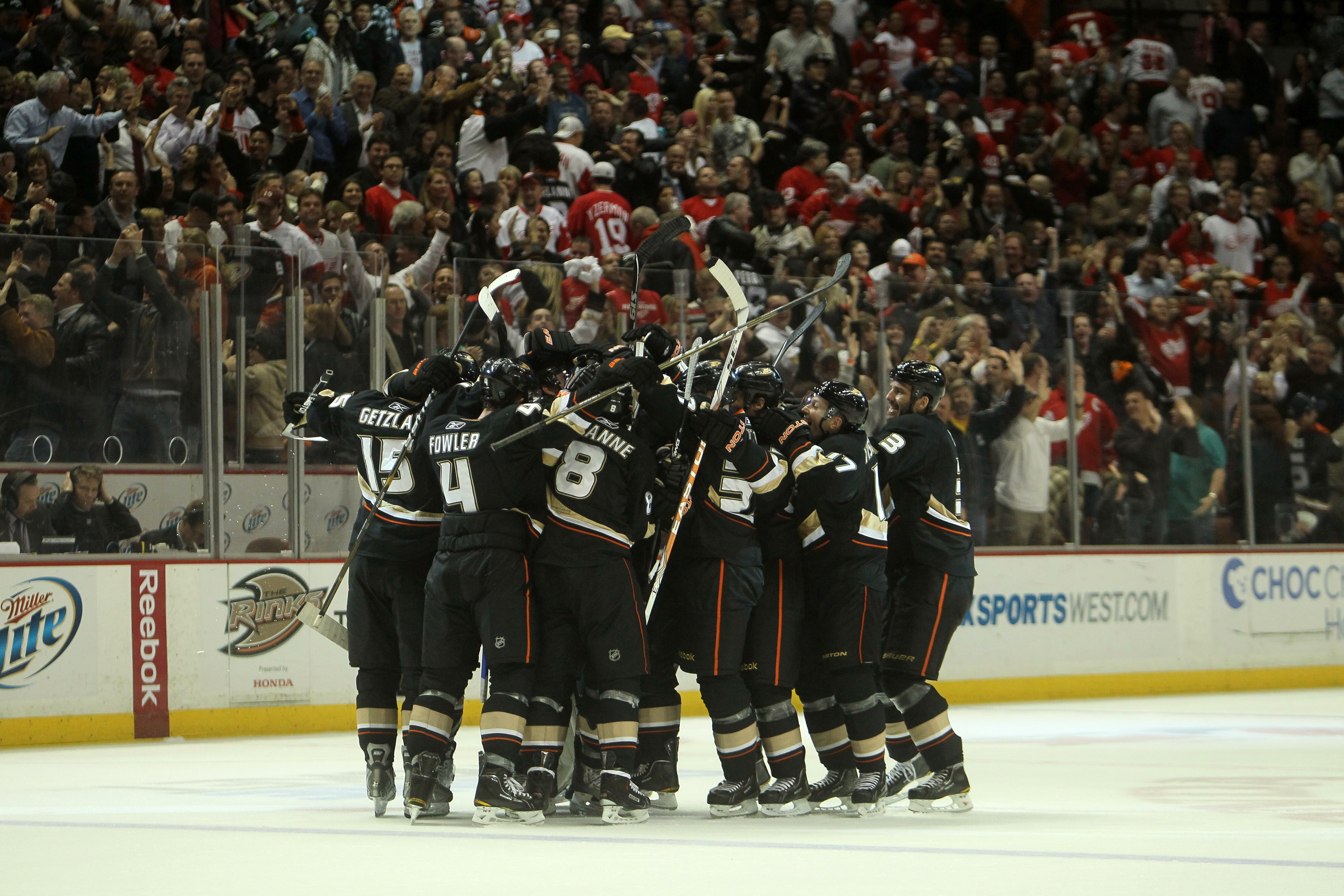 ANAHEIM, CA - MARCH 2:  The Anaheim Ducks celebrate after their sudden death overtime goal against the Detroit Red Wings on March 2, 2011 at the Honda Center in Anaheim, California.   The Ducks won 2-1 in overtime.  (Photo by Stephen Dunn/Getty Images)