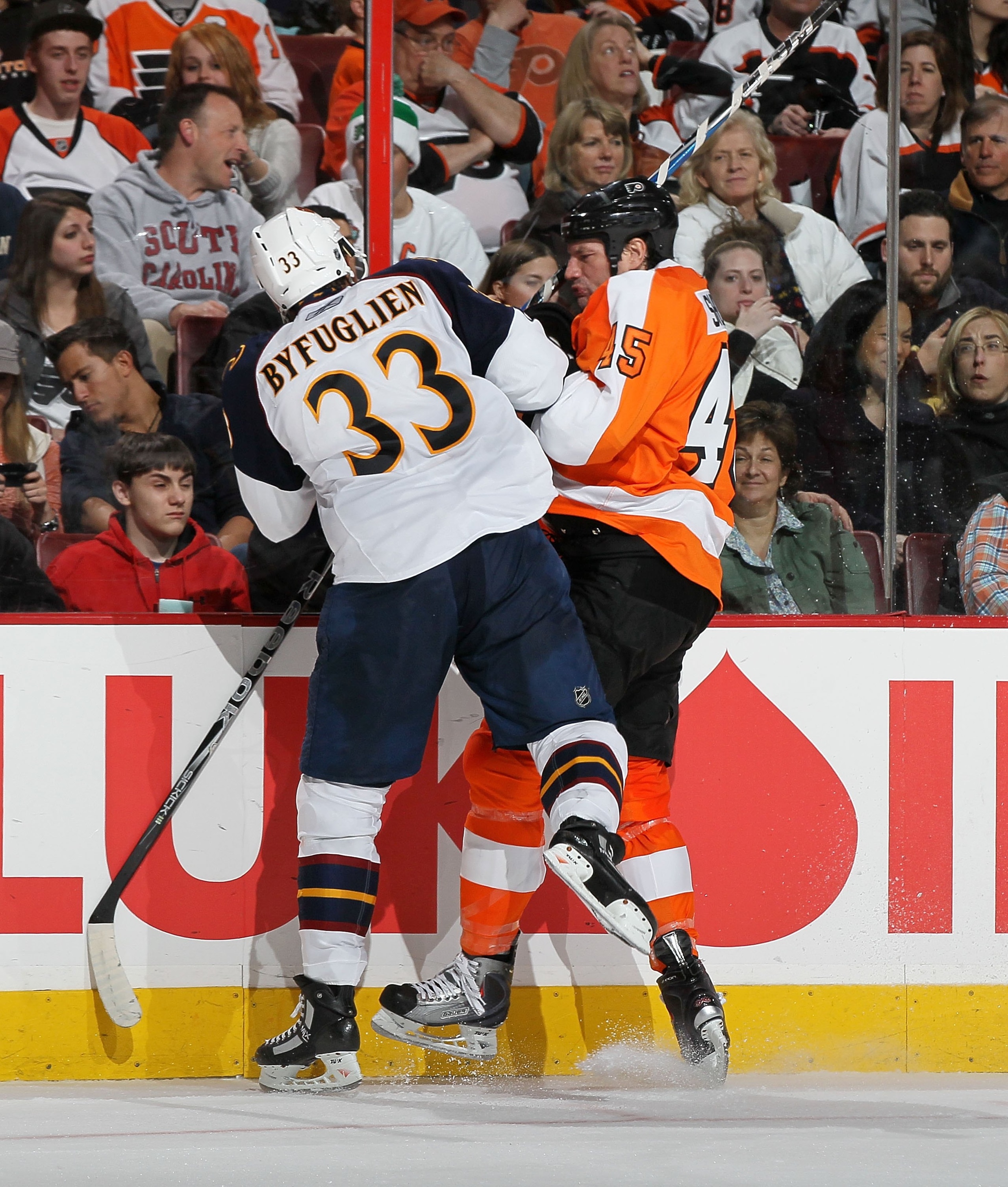PHILADELPHIA, PA - MARCH 12: Dustin Byfuglien #33 of the Atlanta Thrashers skates against Jody Shelley #45 of the Philadelphia Flyers on March 12, 2011 at Wells Fargo Center in Philadelphia, Pennsylvania. (Photo by Jim McIsaac/Getty Images) PHILADELPHIA, PA - MARCH 12: Dustin Byfuglien #33 of the Atlanta Thrashers skates against Jody Shelley #45 of the Philadelphia Flyers on March 12, 2011 at Wells Fargo Center in Philadelphia, Pennsylvania. (Photo by Jim McIsaac/Getty Images)