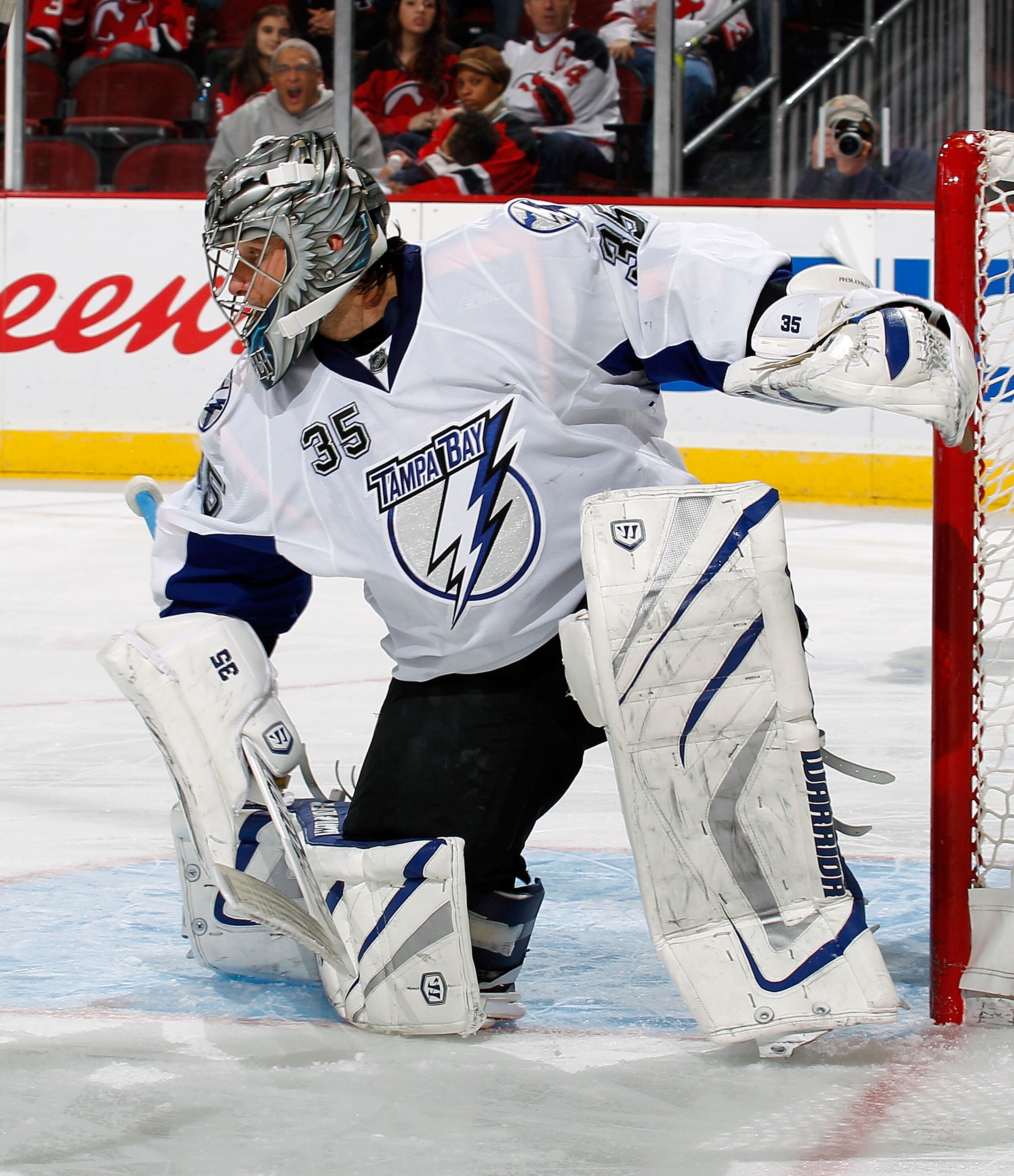 NEWARK, NJ - MARCH 02:  Goalie Dwayne Roloson #35 of the Tampa Bay Lightning protects the goal during an NHL hockey game against the New Jersey Devils at the Prudential Center on March 2, 2011 in Newark, New Jersey.  (Photo by Paul Bereswill/Getty Images)