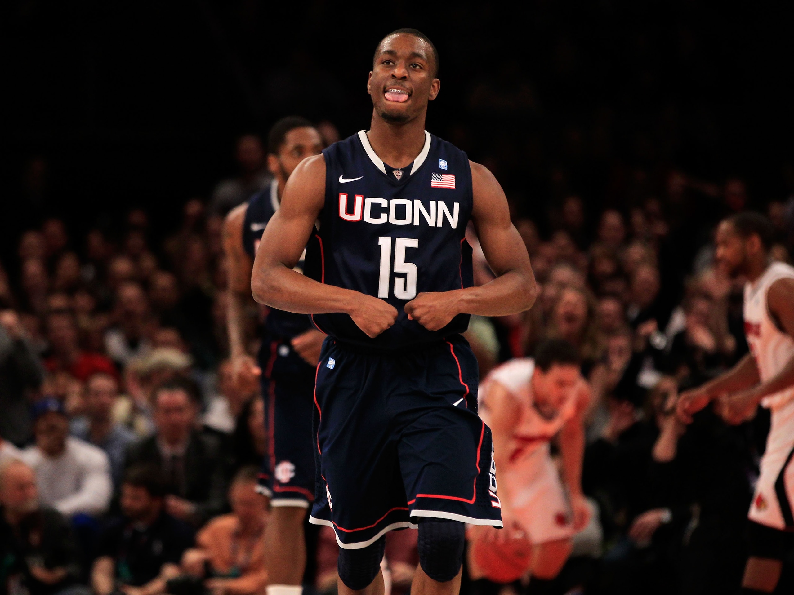 NEW YORK, NY - MARCH 12:  Kemba Walker #15 of the Connecticut Huskies reacts after a play against the Louisville Cardinals during the championship of the 2011 Big East Men's Basketball Tournament presented by American Eagle Outfitters at Madison Square Ga