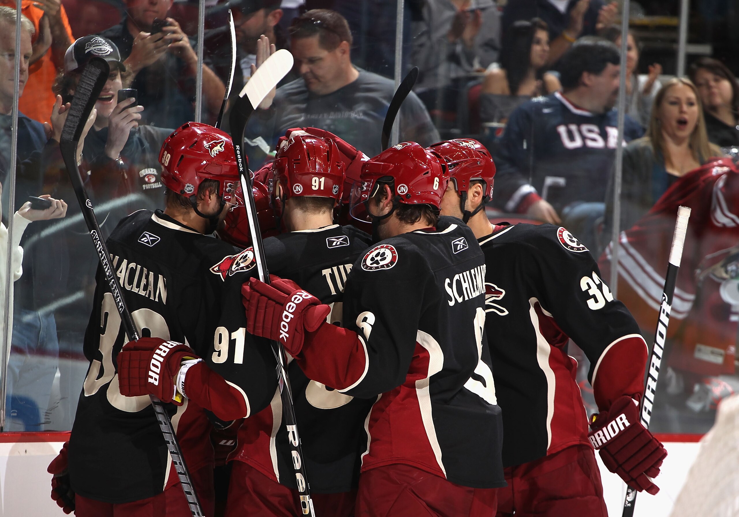GLENDALE, AZ - MARCH 10:  The Phoenix Coyotes celebrate after Brett MacLean #39 scored a second period goal against the Calgary Flames during the NHL game at Jobing.com Arena on March 10, 2011 in Glendale, Arizona.  (Photo by Christian Petersen/Getty Imag