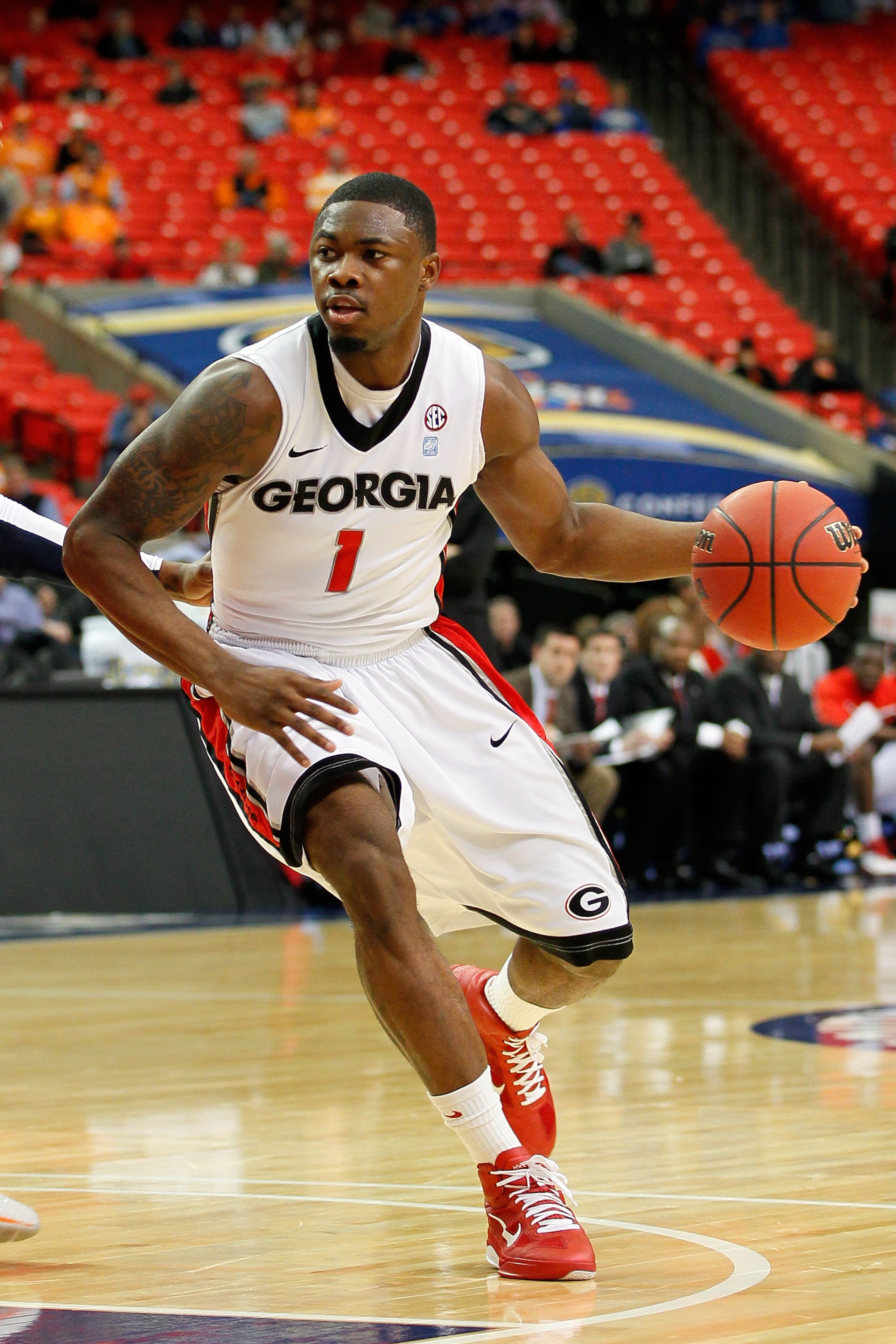 ATLANTA, GA - MARCH 10:  Travis Leslie #1 of the Georgia Bulldogs drives against the Auburn Tigers during the the first round of the SEC Men's Basketball Tournament at the Georgia Dome on March 10, 2011 in Atlanta, Georgia.  (Photo by Kevin C. Cox/Getty I