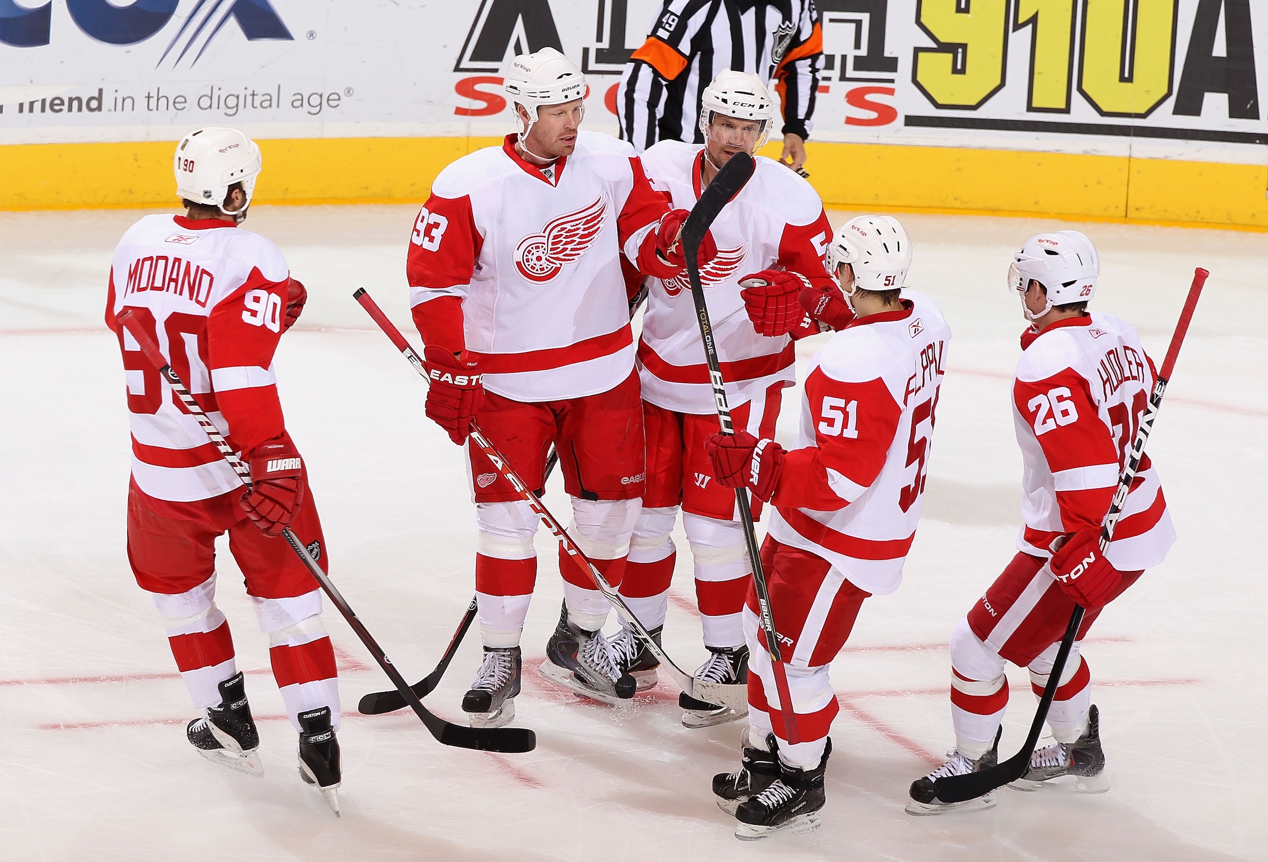 GLENDALE, AZ - MARCH 05:  (L-R) Mike Modano #90, Johan Franzen #93, Nicklas Lidstrom #5, Valtteri Filppula #51 and Jiri Hudler #26 of the Detroit Red Wings celebrate after Franzen scored a first period power play goal against the Phoenix Coyotes during th