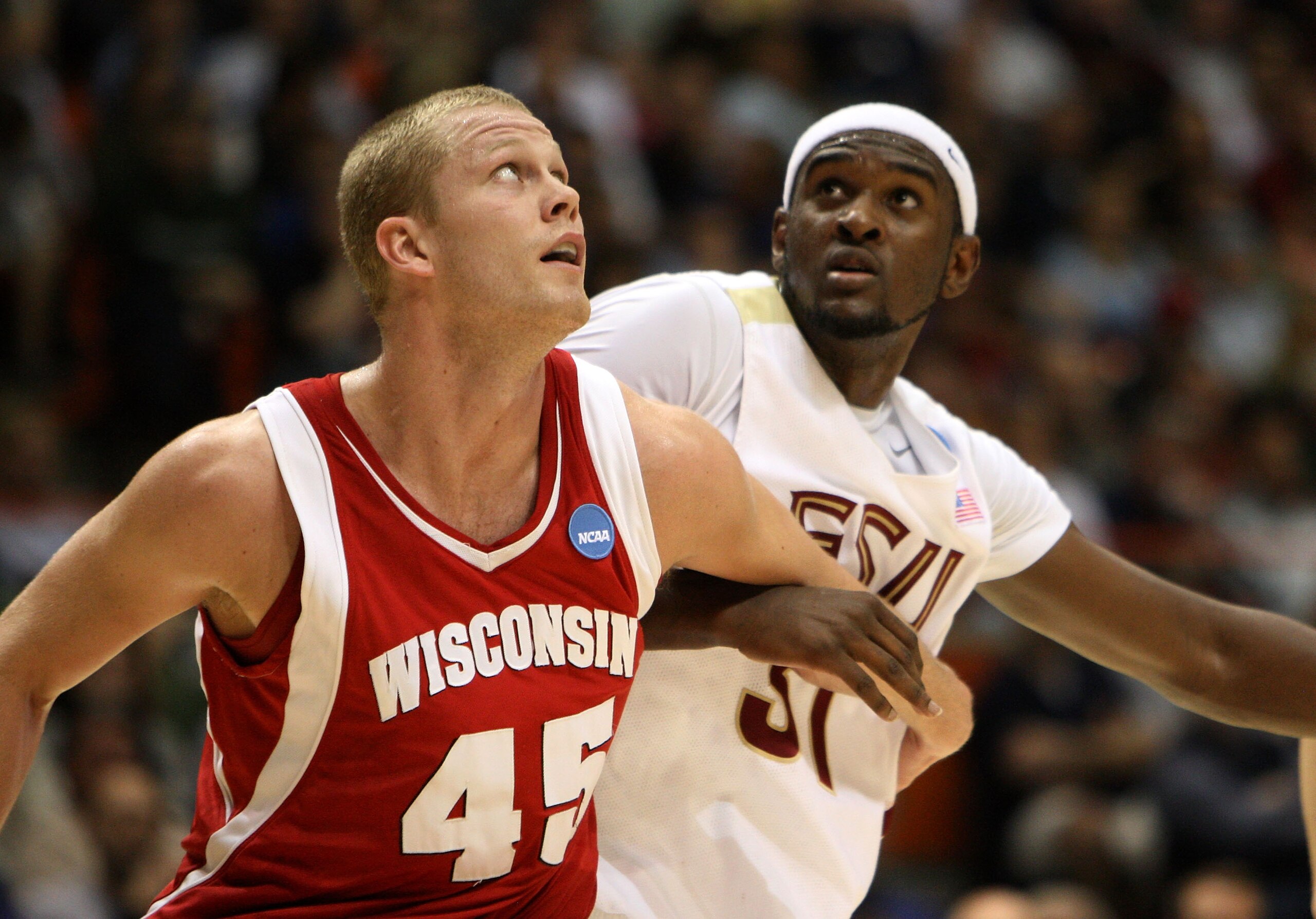 BOISE, ID - MARCH 20:  Forward Joe Krabbenhoft #45 of the Wisconsin Badgers guards forward Chris Singleton #31 of the Florida State Seminoles during the first round of the NCAA Division I Men's Basketball Tournament at the Taco Bell Arena on March 20, 200