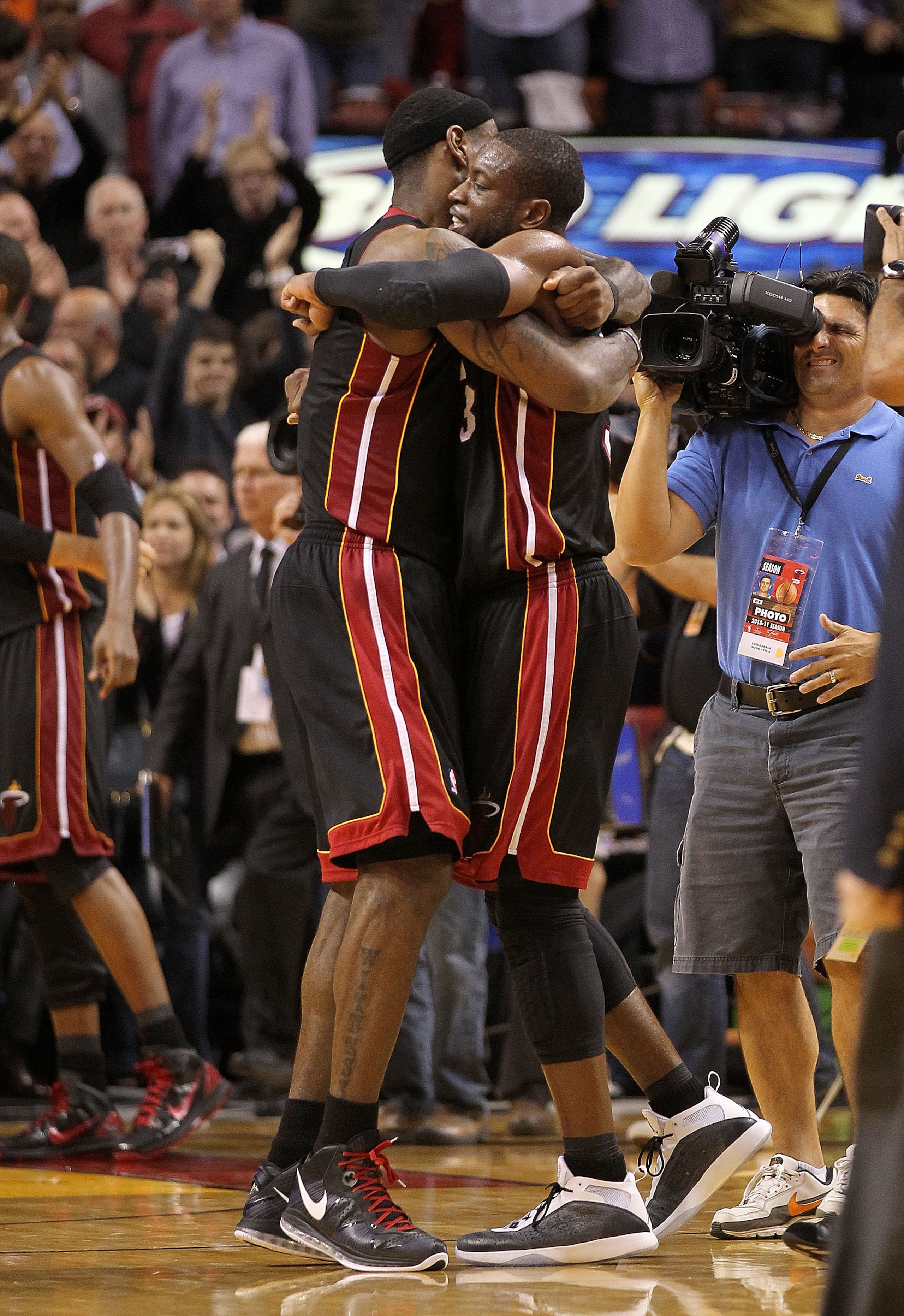 MIAMI, FL - MARCH 10:  Dwyane Wade #3 and LeBron James #6 of the Miami Heat hug after winning a game against  the Los Angeles Lakers at American Airlines Arena on March 10, 2011 in Miami, Florida. NOTE TO USER: User expressly acknowledges and agrees that,