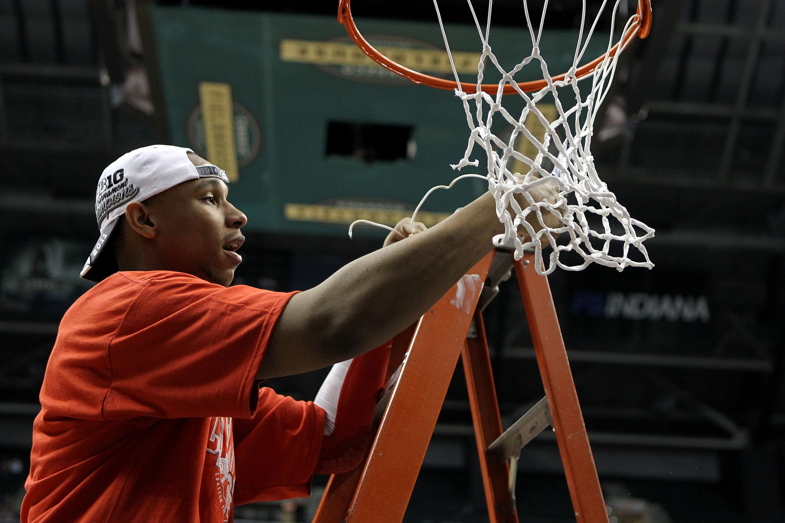 INDIANAPOLIS, IN - MARCH 13:  Jared Sullinger #0 of the Ohio State Buckeyes cuts down a piece of the net in celebration of their 71-60 win against the Penn State Nittany Lions during the championship game of the 2011 Big Ten Men's Basketball Tournament at