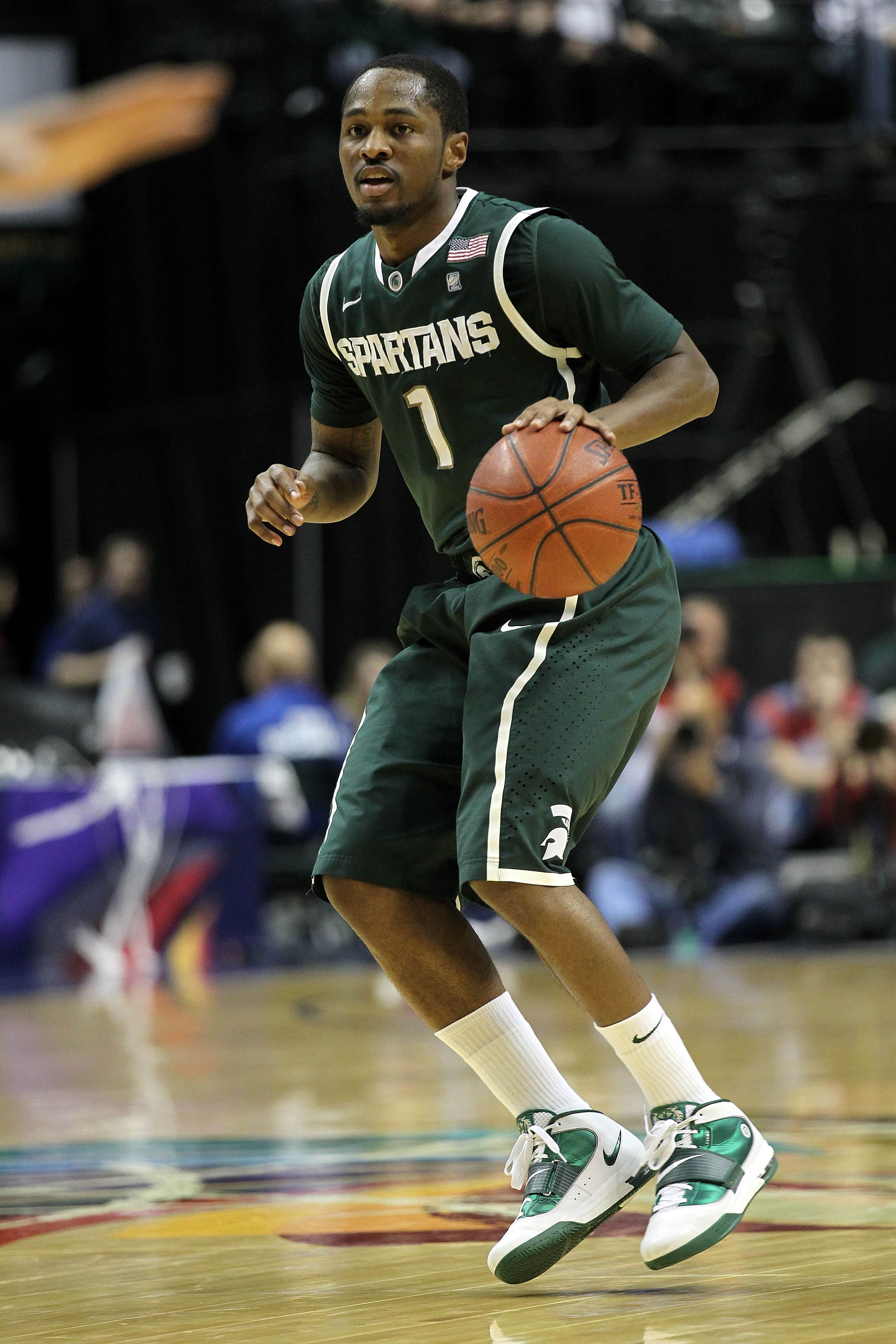 INDIANAPOLIS, IN - MARCH 12: Kalin Lucas #1 of the Michigan State Spartans looks to pass against the Penn State Nittany Lions during the semifinals of the 2011 Big Ten Men's Basketball Tournament at Conseco Fieldhouse on March 12, 2011 in Indianapolis, I