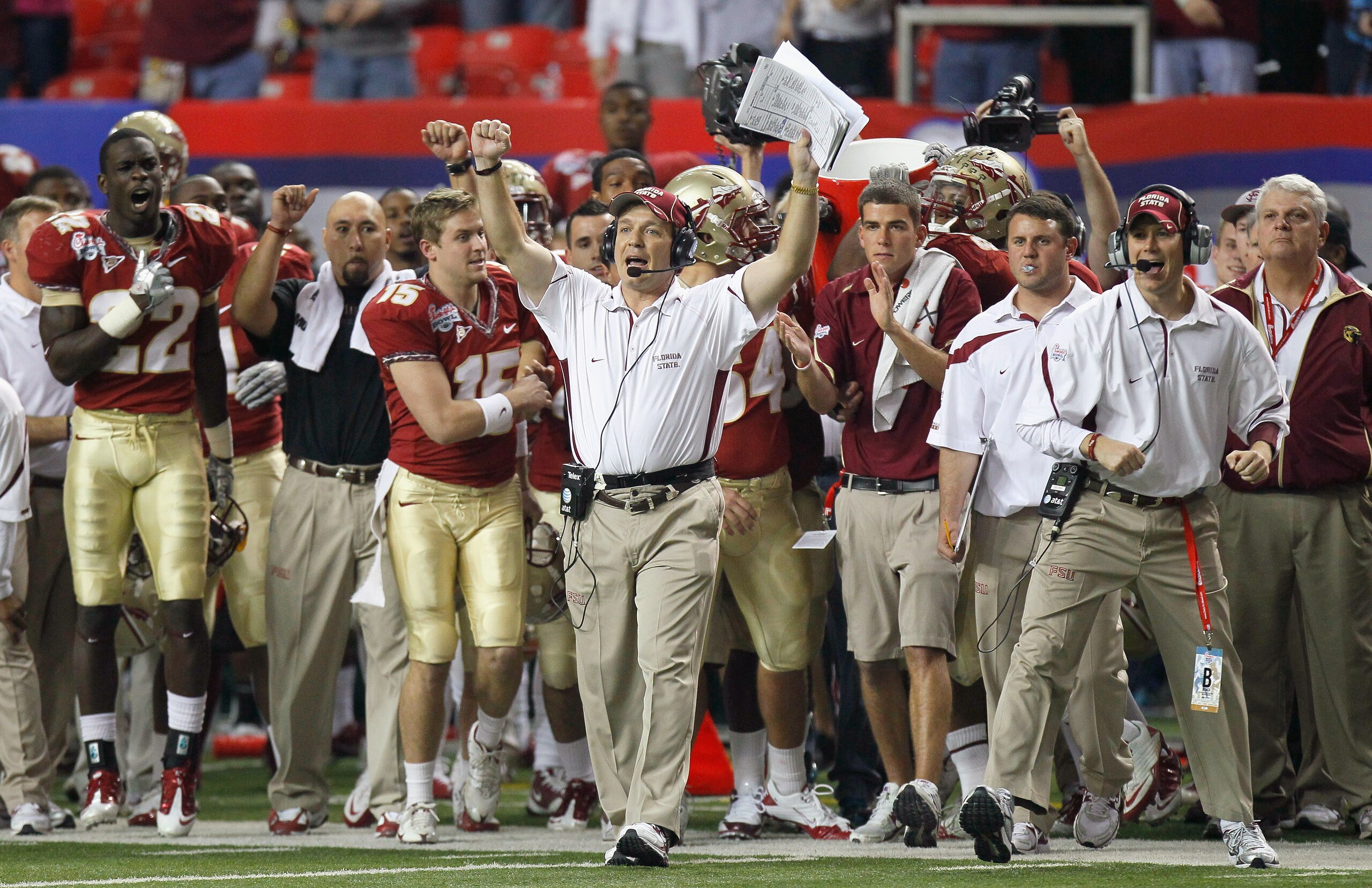 ATLANTA, GA - DECEMBER 31:  Head coach Jimbo Fisher and the Florida State Seminoles sideline reacts after getting a first down in the final seconds of their 26-17 win over the South Carolina Gamecocks during the 2010 Chick-fil-A Bowl at Georgia Dome on De