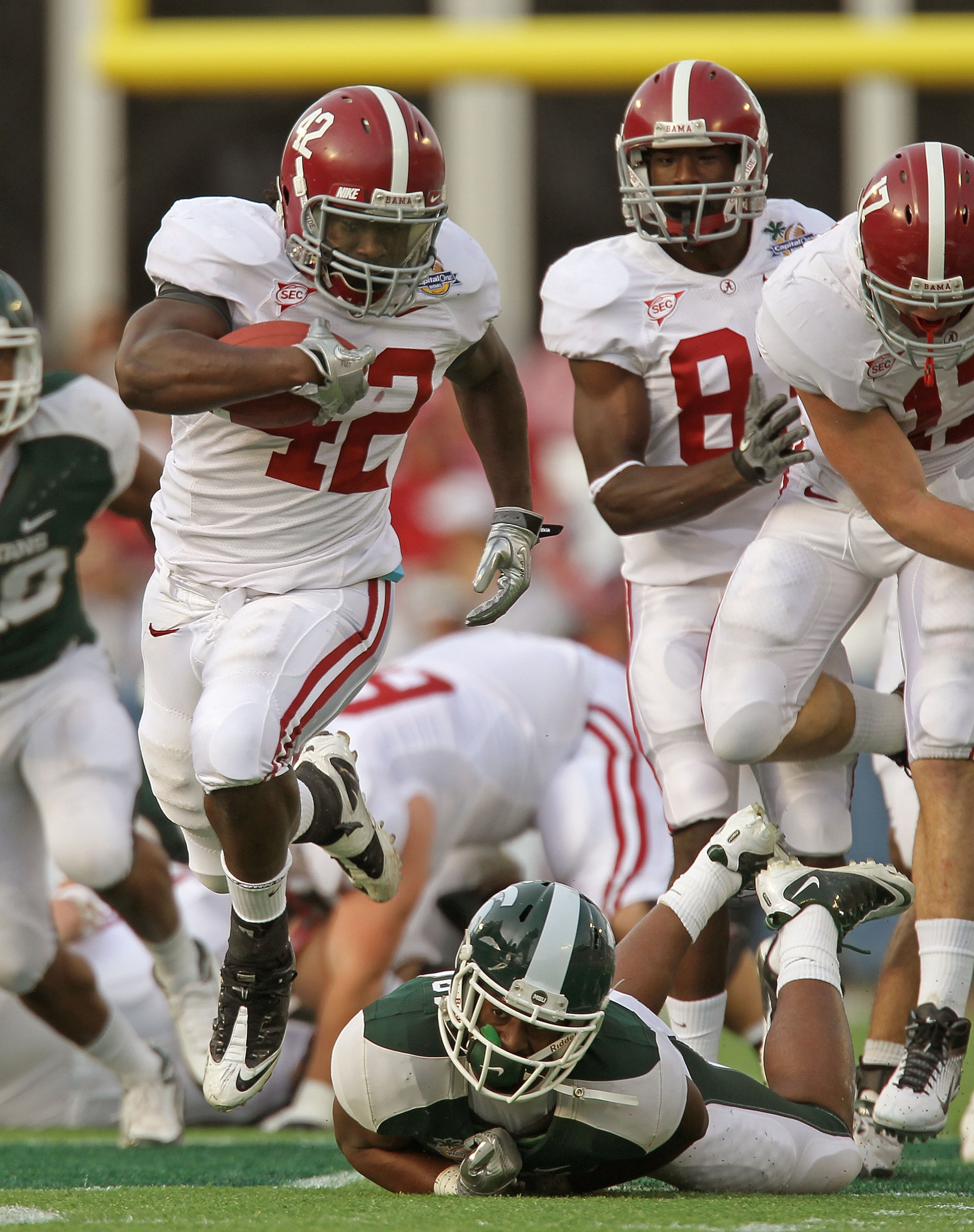 ORLANDO, FL - JANUARY 01:  Eddie Lacy #42 of the Alabama Crimson Tide rushes for a touchdown during the Capitol One Bowl against the Michigan State Spartans at the Florida Citrus Bowl on January 1, 2011 in Orlando, Florida.  (Photo by Mike Ehrmann/Getty I