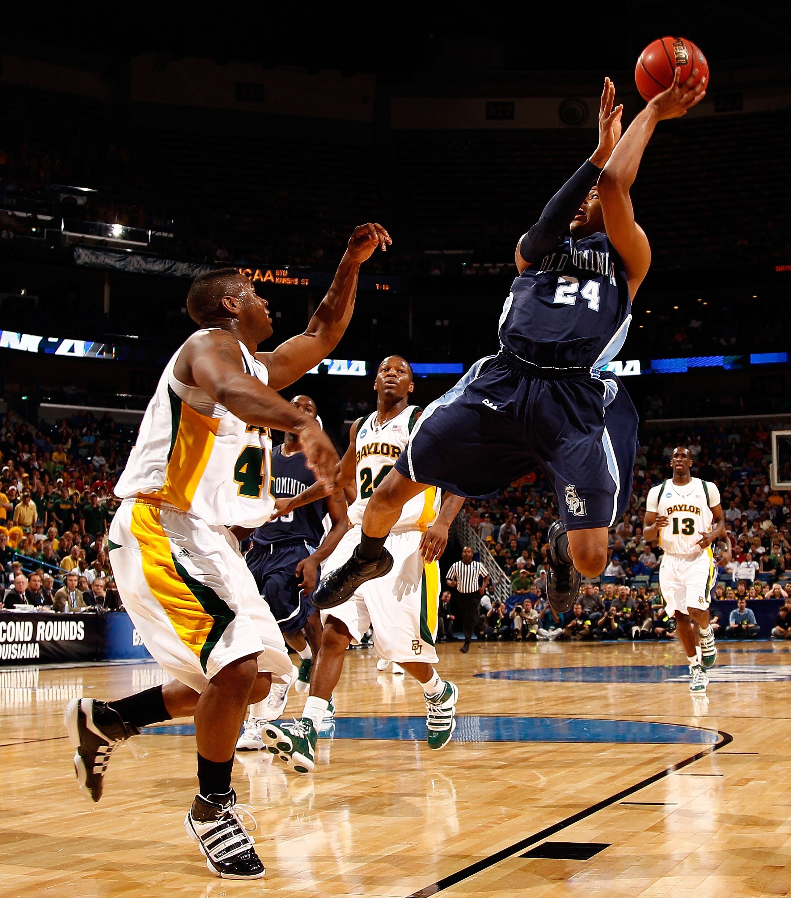 NEW ORLEANS - MARCH 20:  Kent Bazemore #24 of the Old Dominion University Monarchs shoots the ball over Tweety Carter #45 of the Baylor Bears during the second round of the 2010 NCAA men's basketball tournament at the New Orleans Arena on March 20, 2010 i