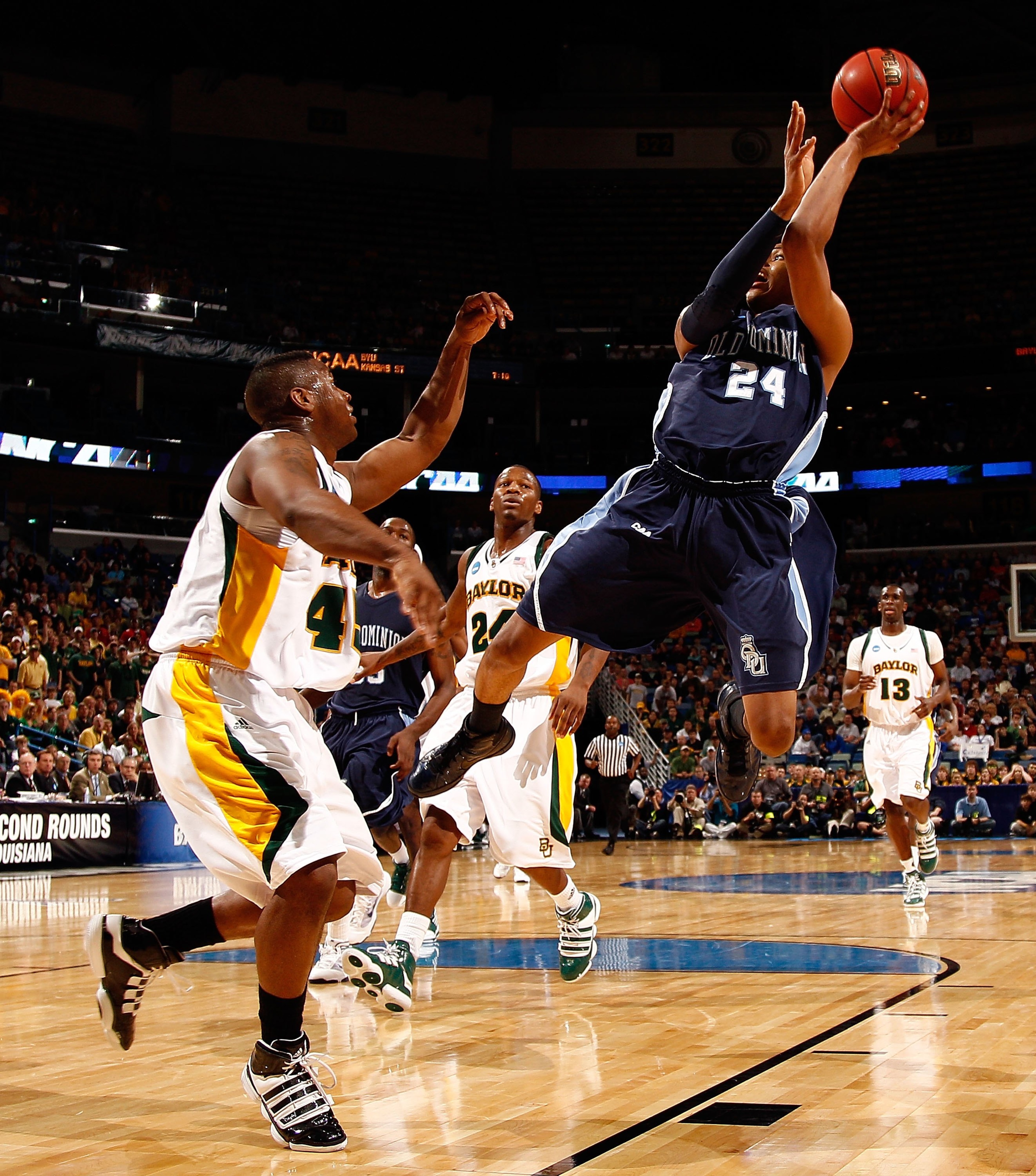NEW ORLEANS - MARCH 20:  Kent Bazemore #24 of the Old Dominion University Monarchs shoots the ball over Tweety Carter #45 of the Baylor Bears during the second round of the 2010 NCAA men's basketball tournament at the New Orleans Arena on March 20, 2010 i