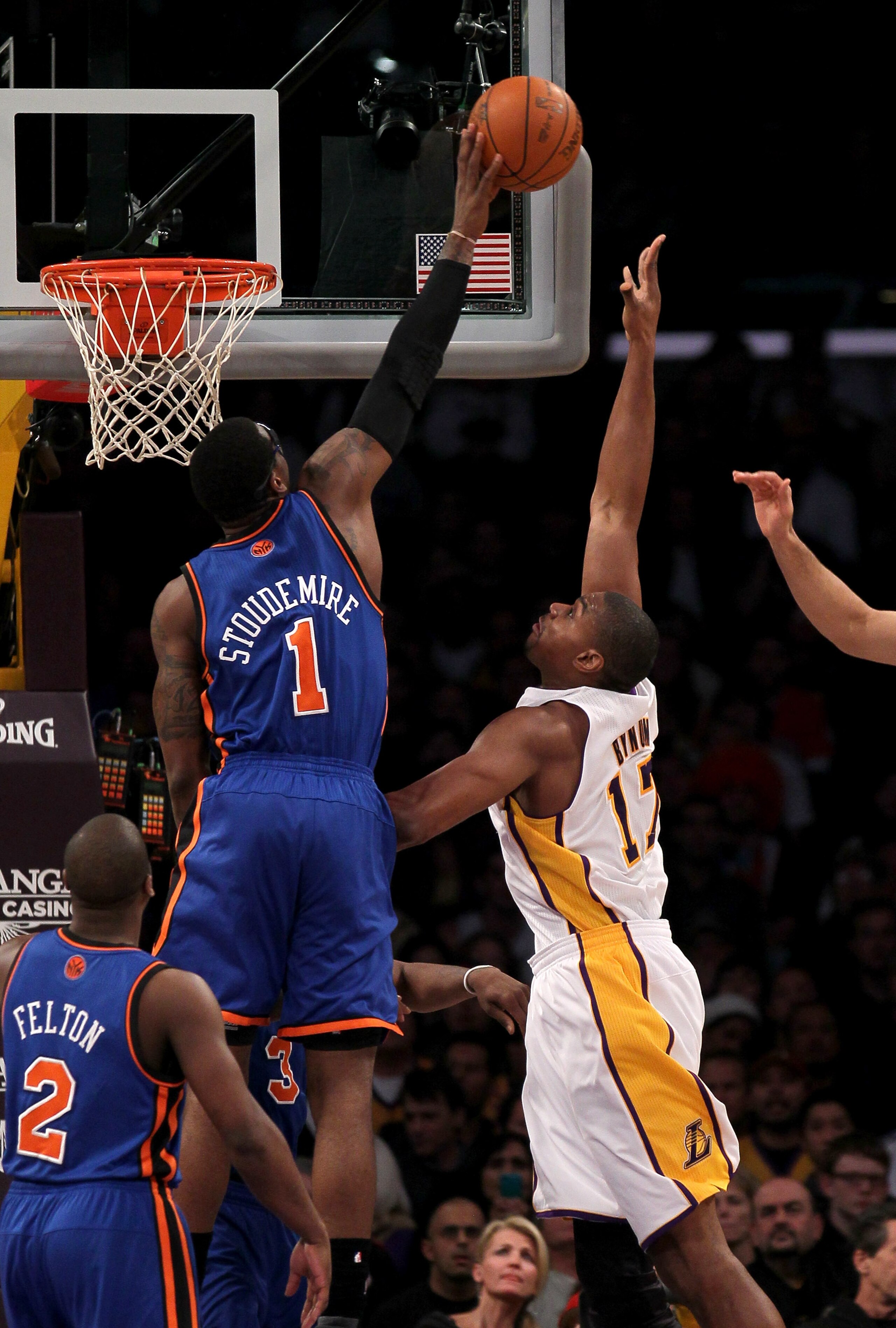 LOS ANGELES, CA - JANUARY 09:  Amar'e Stoudemire #1 of the New York Knicks blocks a shot by Andrew Bynum #17 of the Los Angeles Lakers at Staples Center on January 9, 2011 in Los Angeles, California.  NOTE TO USER: User expressly acknowledges and agrees t