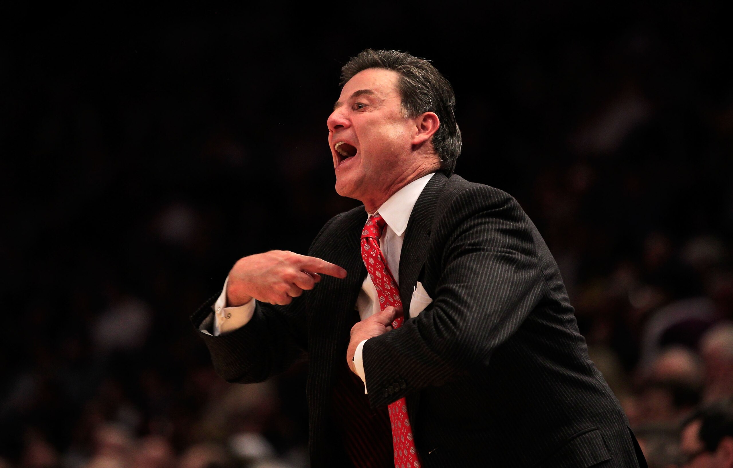 NEW YORK, NY - MARCH 11:  head coach Rick Pitino of the Louisville Cardinals looks on from the bench during the game against the Notre Dame Fighting Irish during the semifinals of the 2011 Big East Men's Basketball Tournament presented by American Eagle O