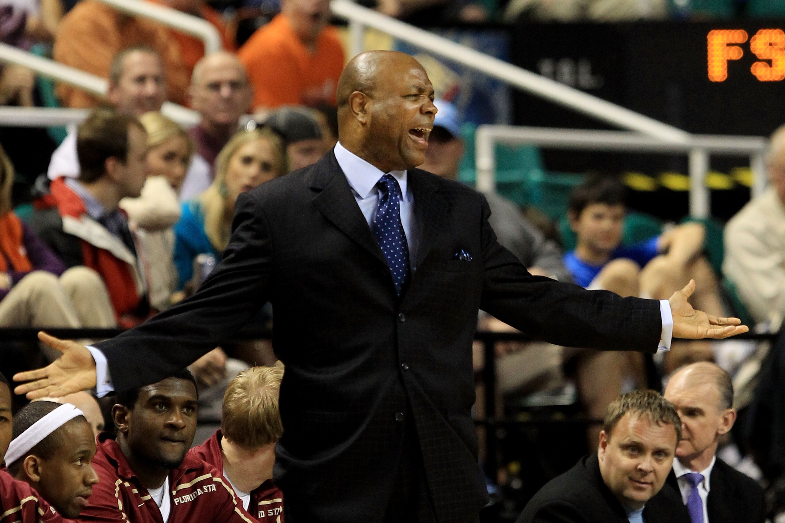 GREENSBORO, NC - MARCH 11:  Head coach Leonard Hamilton of the Florida State Seminoles reacts while playing against Virginia the Tech Hokies  during the first half in the quarterfinals of the 2011 ACC men's basketball tournament at the Greensboro Coliseum