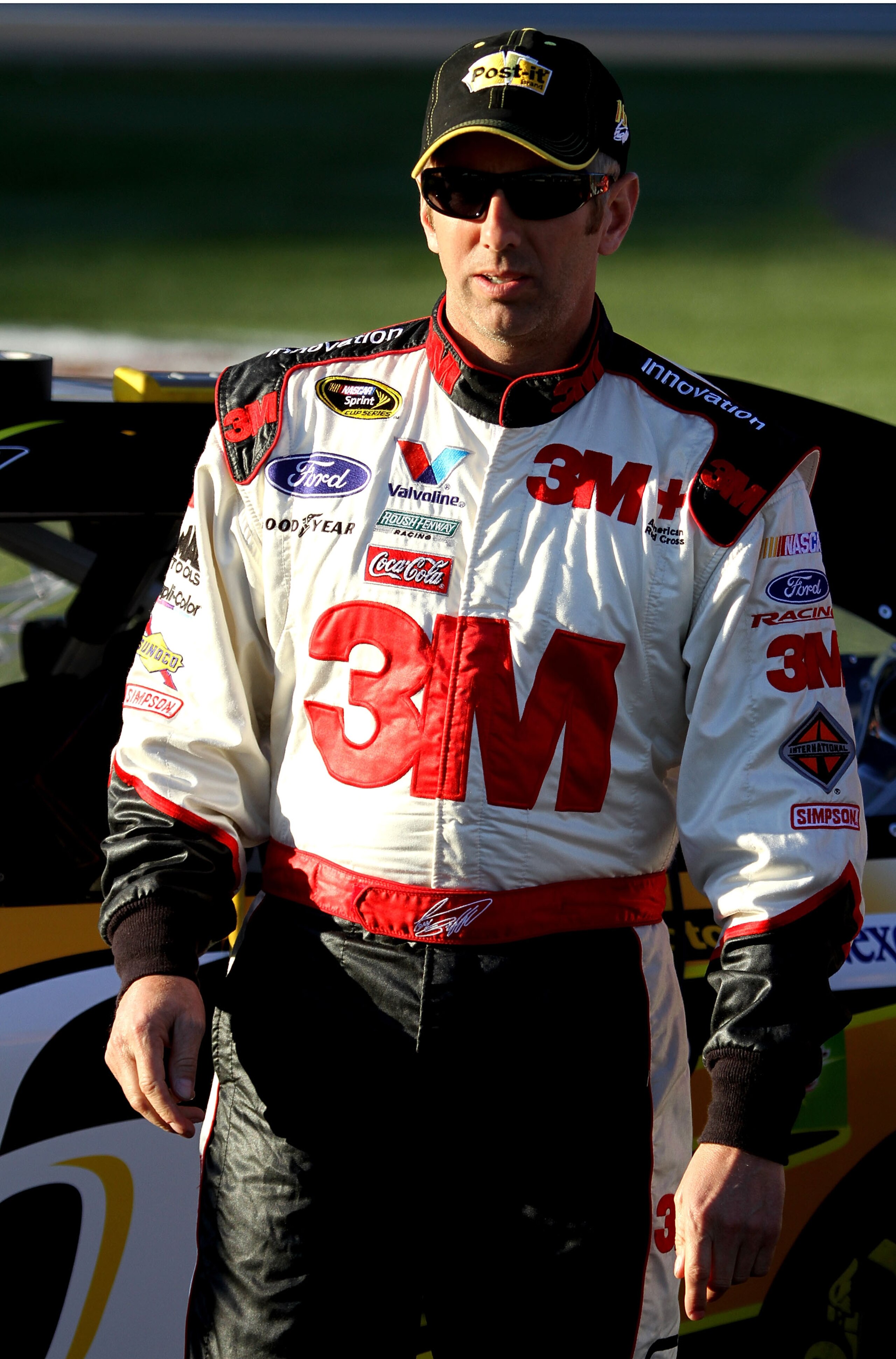 LAS VEGAS, NV - MARCH 04: Greg Biffle, driver of the #16 3M Post-it Ford, walks on the gird during qualifying for the NASCAR Sprint Cup Series Kobalt Tools 400 at Las Vegas Motor Speedway on March 4, 2011 in Las Vegas, Nevada. (Photo by Jerry Markland/G LAS VEGAS, NV - MARCH 04: Greg Biffle, driver of the #16 3M Post-it Ford, walks on the gird during qualifying for the NASCAR Sprint Cup Series Kobalt Tools 400 at Las Vegas Motor Speedway on March 4, 2011 in Las Vegas, Nevada. (Photo by Jerry Markland/G