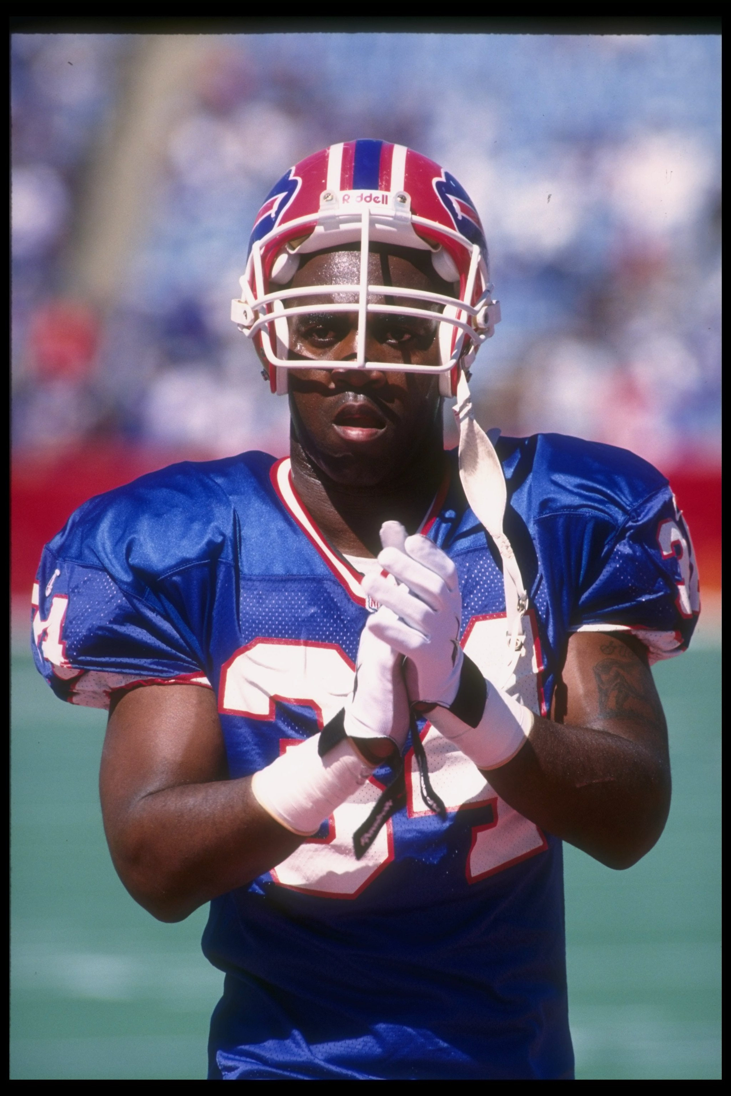 10 Sep 1995: Running back Thurman Thomas of the Buffalo Bills looks on during a game against the Carolina Panthers at Rich Stadium in Orchard Park, New York. The Bills won the game, 31-9.