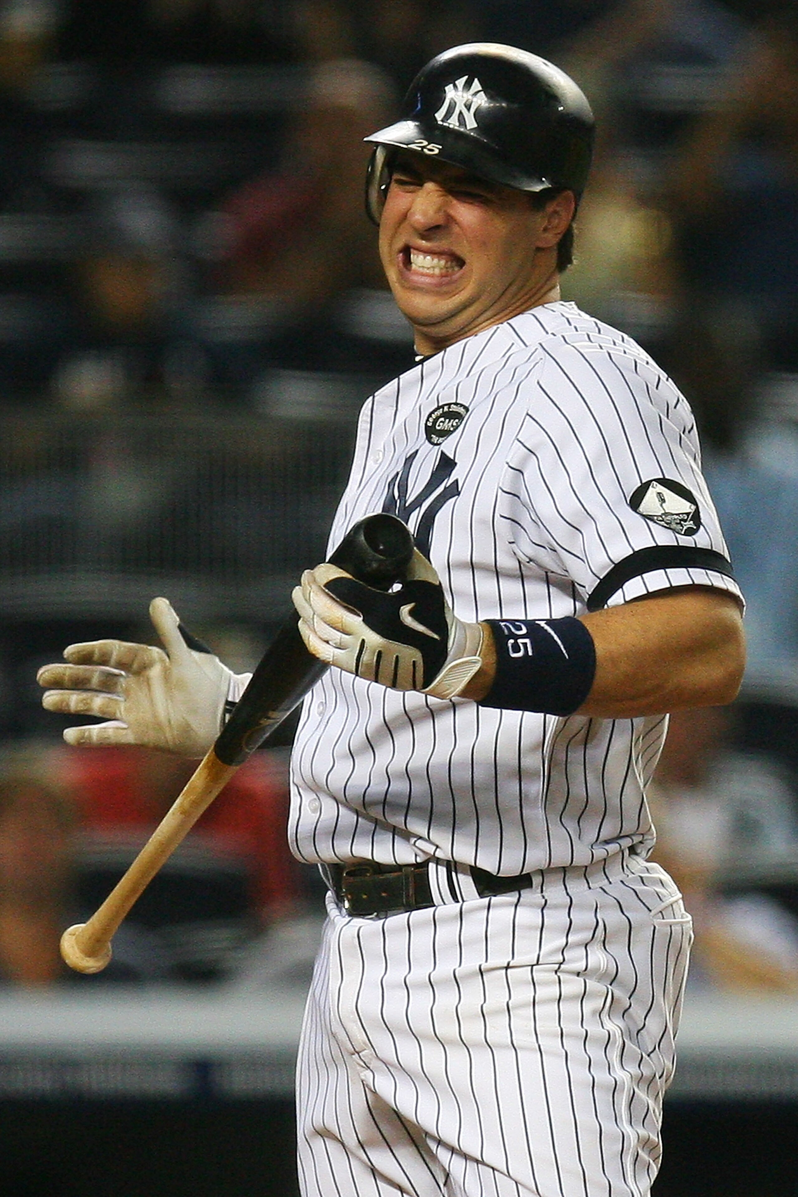 NEW YORK - SEPTEMBER 22:  Mark Teixeira #25 of the New York Yankees reacts after being hit by a pitch from Jeremy Hellickson of the Tampa Bay Rays on September 22, 2010 at Yankee Stadium in the Bronx borough of New York City.  (Photo by Andrew Burton/Gett