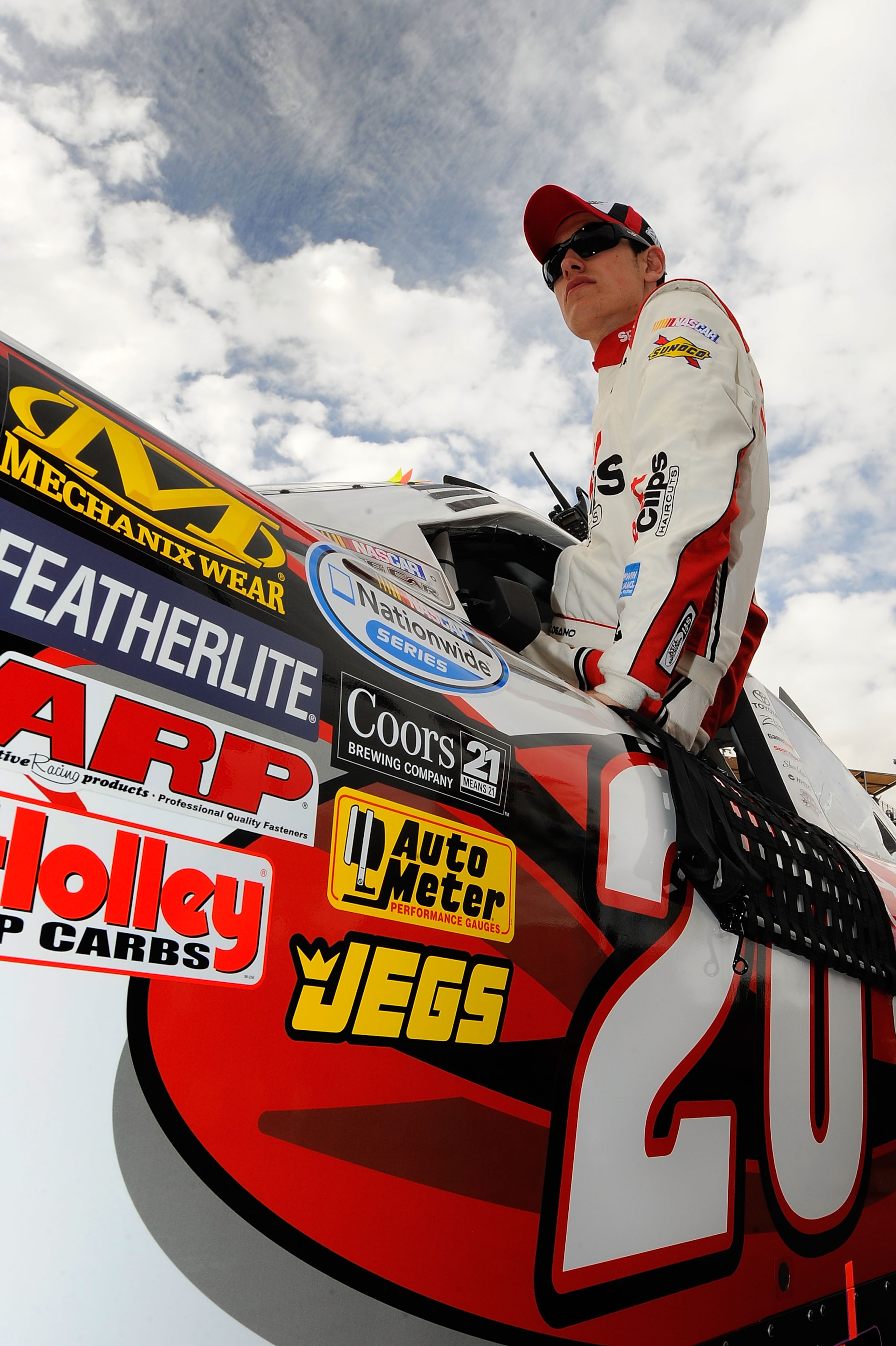 AVONDALE, AZ - FEBRUARY 26: Joey Logano, driver of the #20 SportClips Toyota, climbs in his car prior to the NASCAR Nationwide Series Bashas' Supermarkets 200 at Phoenix International Raceway on February 26, 2011 in Avondale, Arizona. (Photo by Jared C. AVONDALE, AZ - FEBRUARY 26: Joey Logano, driver of the #20 SportClips Toyota, climbs in his car prior to the NASCAR Nationwide Series Bashas' Supermarkets 200 at Phoenix International Raceway on February 26, 2011 in Avondale, Arizona. (Photo by Jared C.