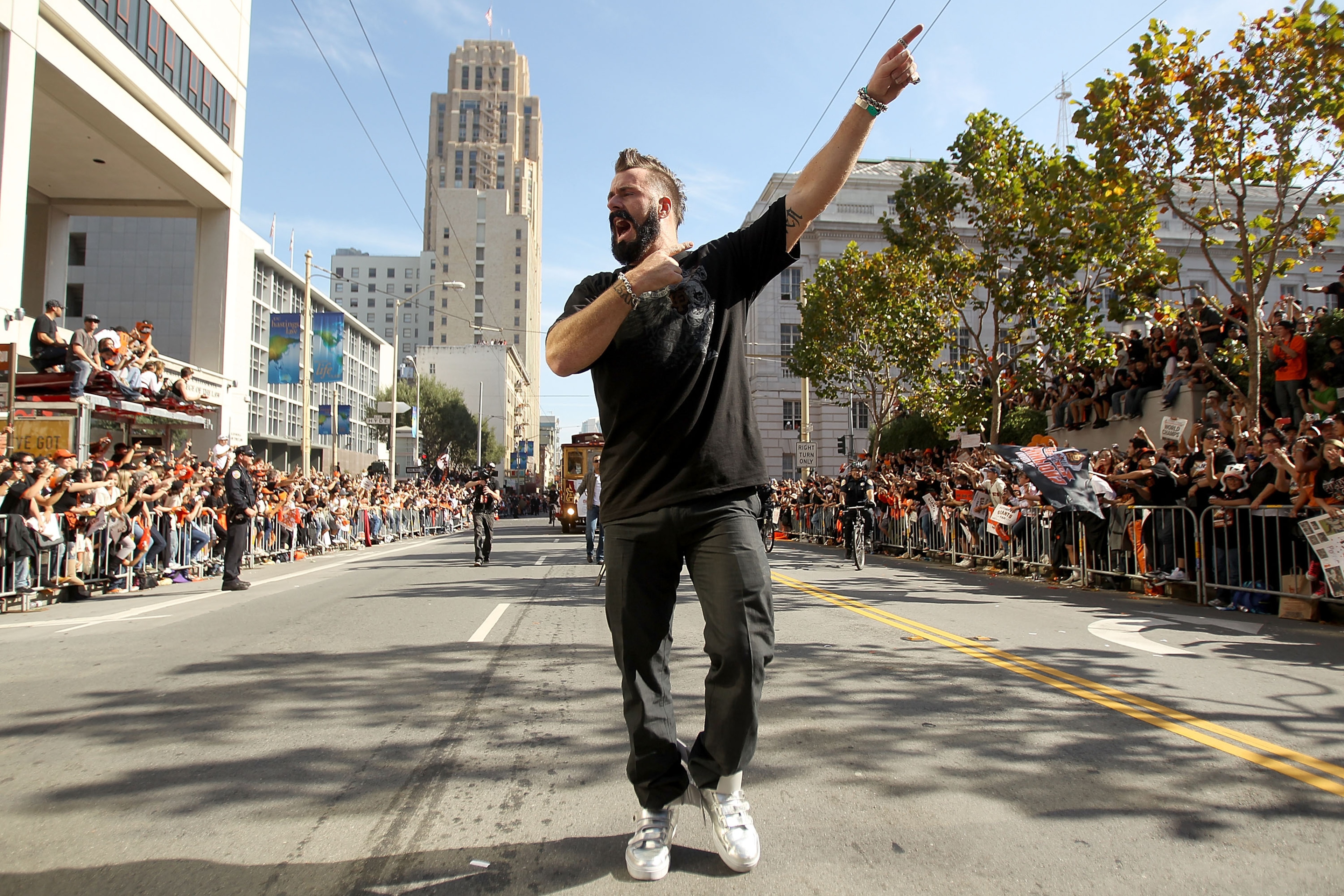 SAN FRANCISCO - NOVEMBER 03:  Pitcher Brian Wilson of the San Francisco Giants walks down the street during the San Francisco Giants victory parade on November 3, 2010 in San Francisco, California.  (Photo by Ezra Shaw/Getty Images)