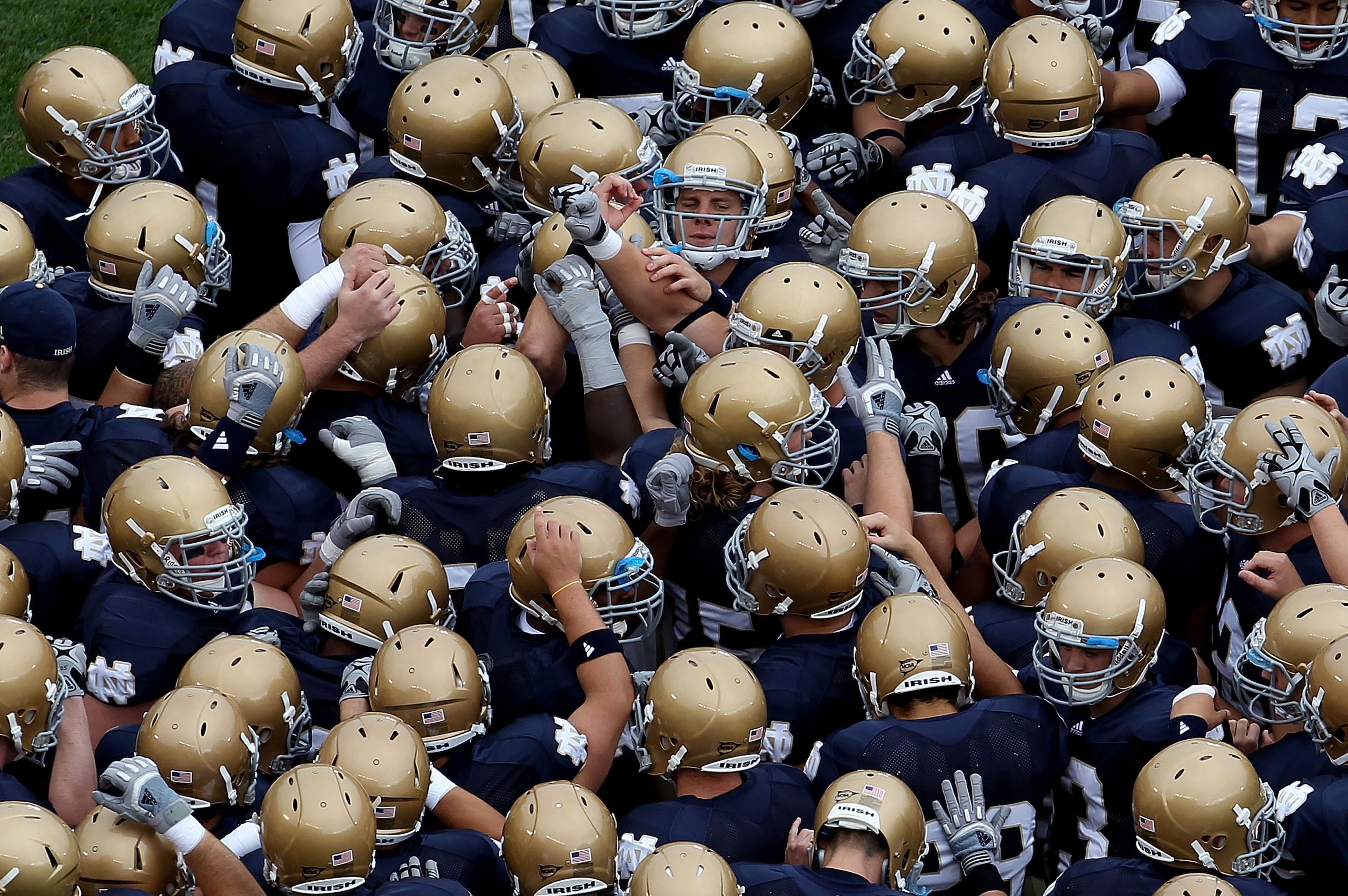 SOUTH BEND, IN - SEPTEMBER 25: Members of the Notre Dame Fighting Irish get ready during warm-ups to play the Stanford Cardinal at Notre Dame Stadium on September 25, 2010 in South Bend, Indiana. Stanford defeated Notre Dame 37-14. (Photo by Jonathan Dani