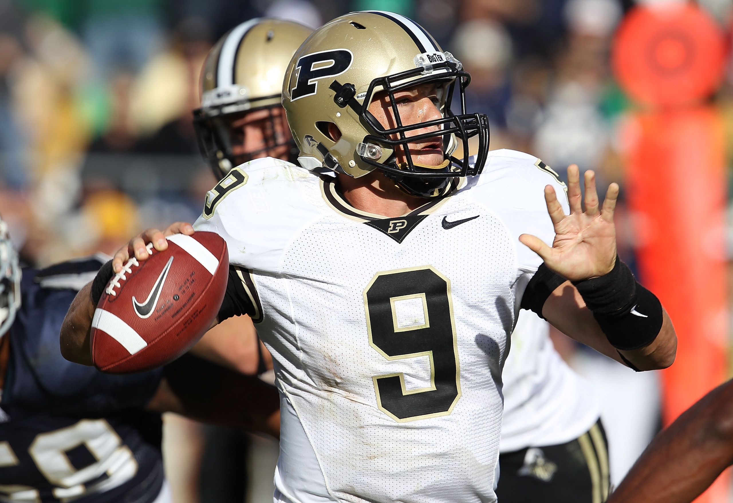 SOUTH BEND, IN - SEPTEMBER 04: Robert Marve #9 of the Purdue Boilermakers throws a pass against the Notre Dame Fighting Irish at Notre Dame Stadium on September 4, 2010 in South Bend, Indiana. Notre Dame defated Purdue 23-12. (Photo by Jonathan Daniel/Get