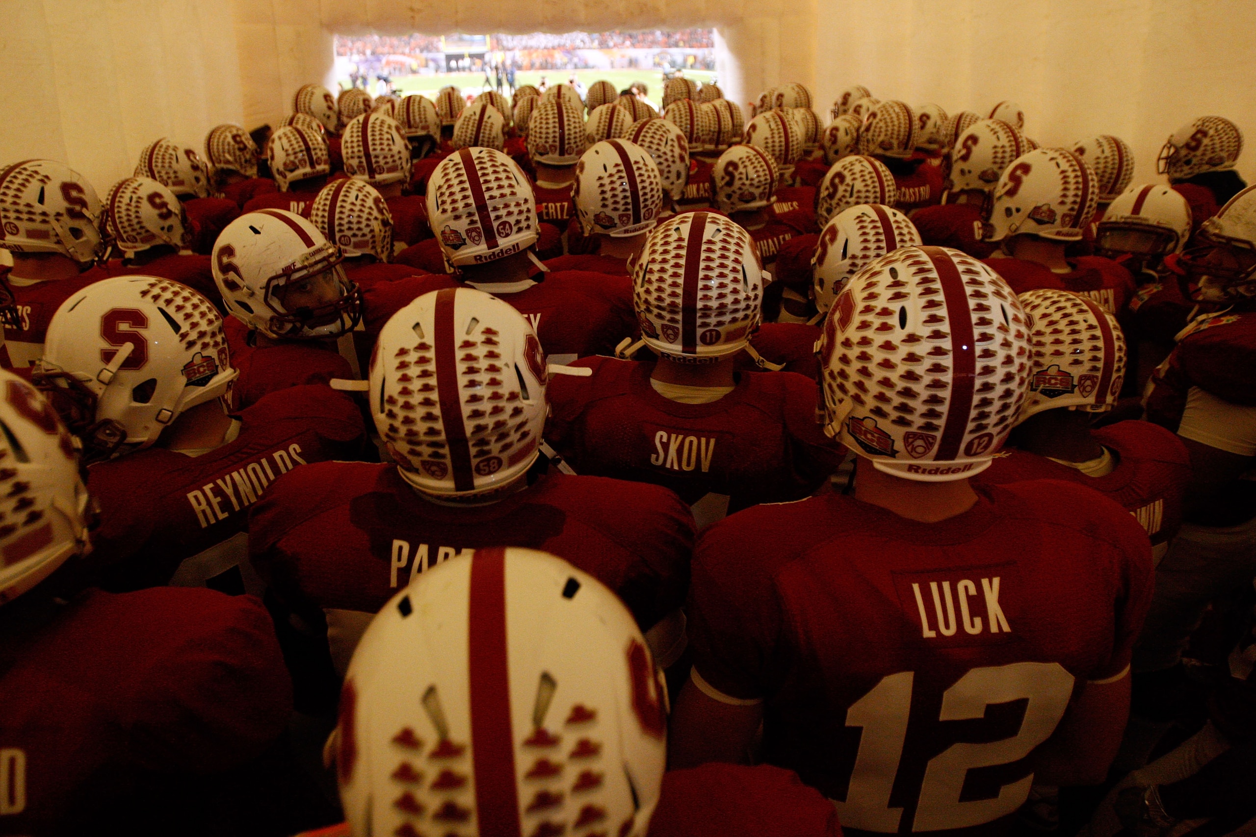 MIAMI, FL - JANUARY 03: Quarterback Andrew Luck #12 of the Stanford Cardinal gets ready to run onto the field with his teammates to play against the Virginia Tech Hokies during the 2011 Discover Orange Bowl at Sun Life Stadium on January 3, 2011 in Miami,