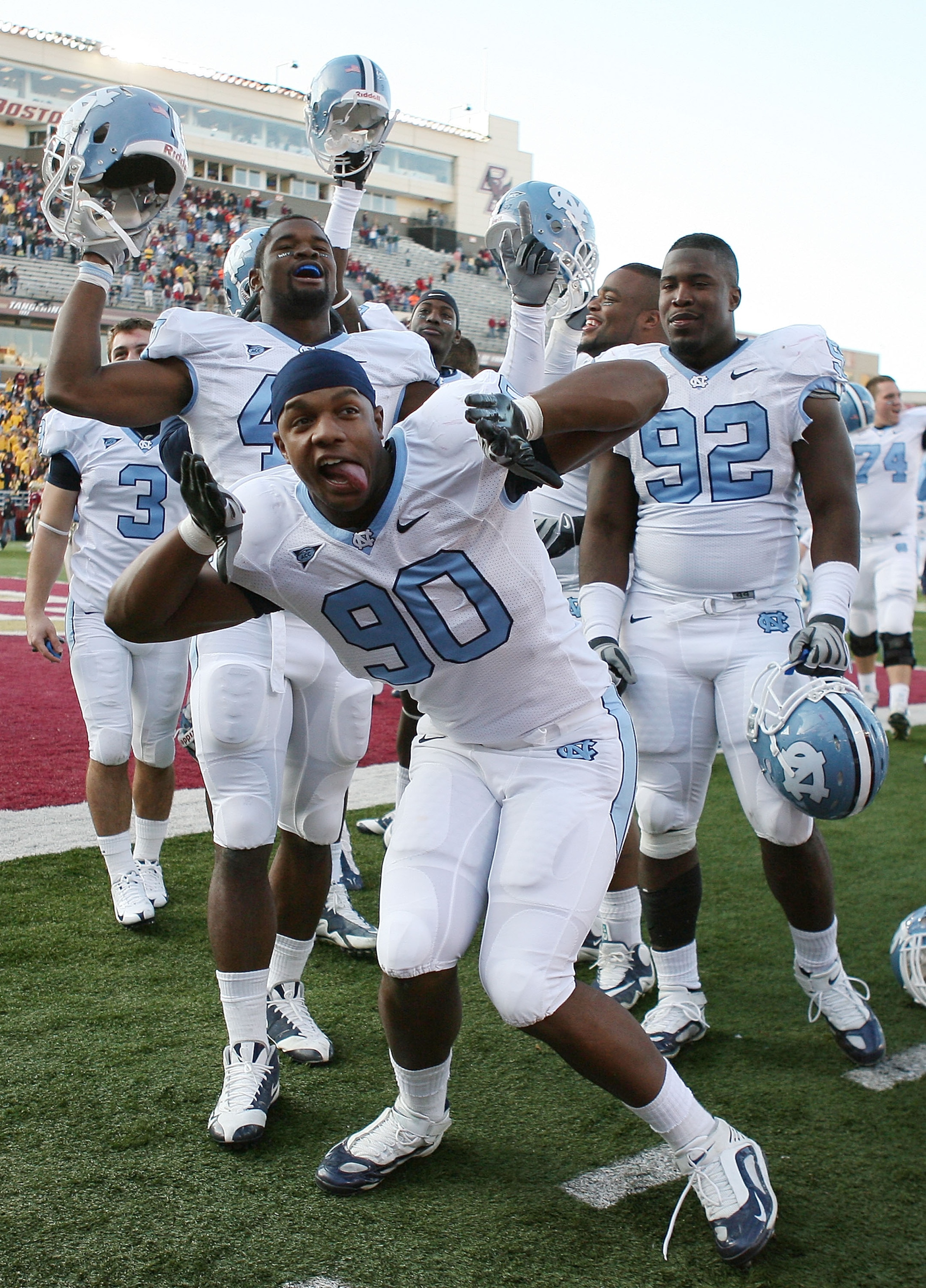 CHESTNUT HILL, MA - NOVEMBER 21:  Quinton Coples #90 of the North Carolina Tar Heels and the rest of his teammates celebrate the win over the Boston College Eagles on November 21, 2009 at Alumni Stadium in Chestnut Hill, Massachusetts. The Tar Heels defea