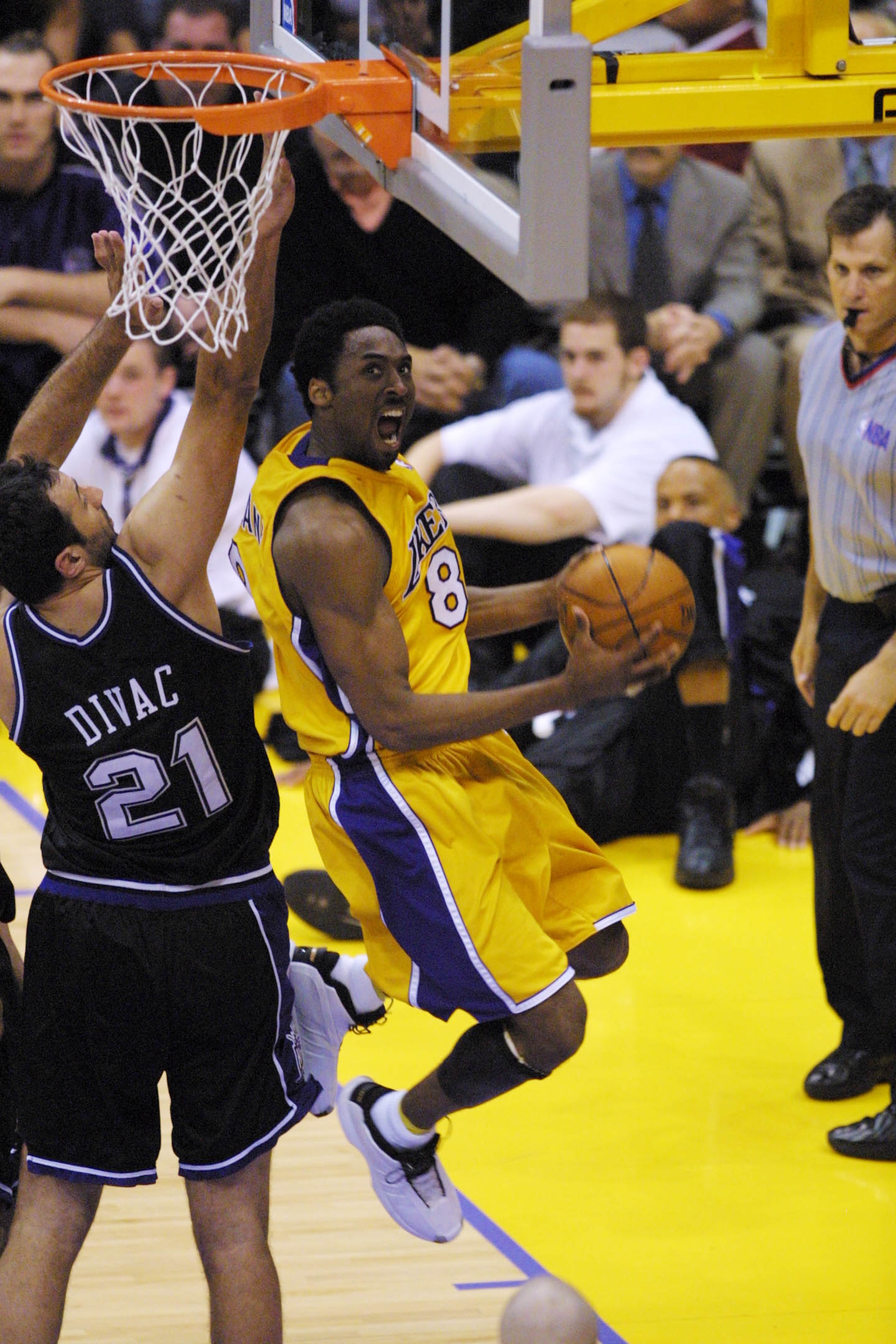 8 May 2001:  Kobe Bryant #8 of the Los Angeles Lakers puts a shot up against Vlade Divac #21 of the Sacramento Kings  in game one of the western conference semi-finals at Staples Center in Los Angeles, California.  The Lakers won 96-90.  DIGITAL IMAGE.  M