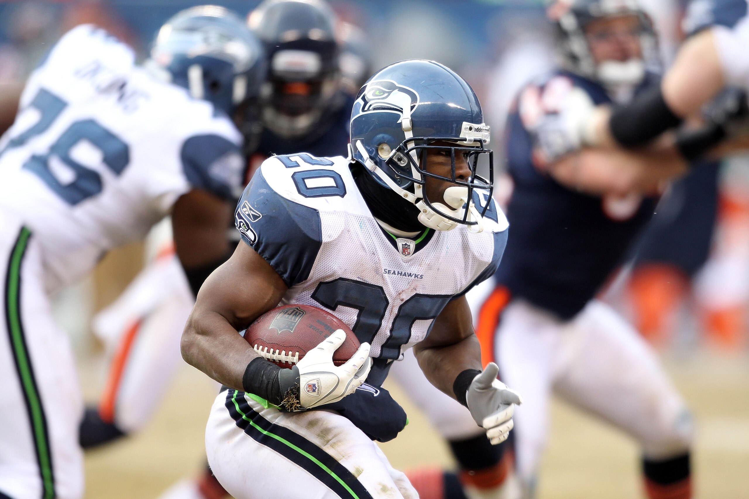 CHICAGO, IL - JANUARY 16:  Justin Forsett #20 of the Seattle Seahawks carries the ball against the Chicago Bears in the 2011 NFC divisional playoff game at Soldier Field on January 16, 2011 in Chicago, Illinois.  (Photo by Andy Lyons/Getty Images)
