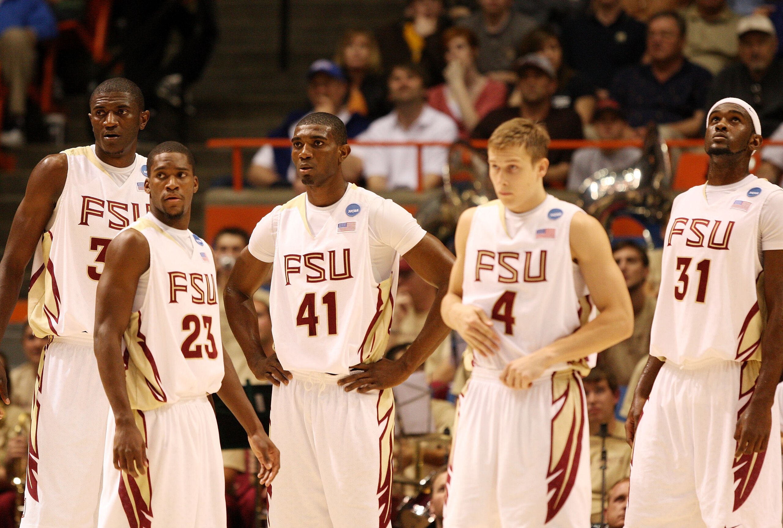 BOISE, ID - MARCH 20:  (L-R) Solomon Alabi #32, Toney Douglas #23, Uche Echefu #41, Deividas Dulkys #4 and Chris Singleton #31 of the Florida State Seminoles stand on the court during their game against the Wisconsin Badgers during the first round of the