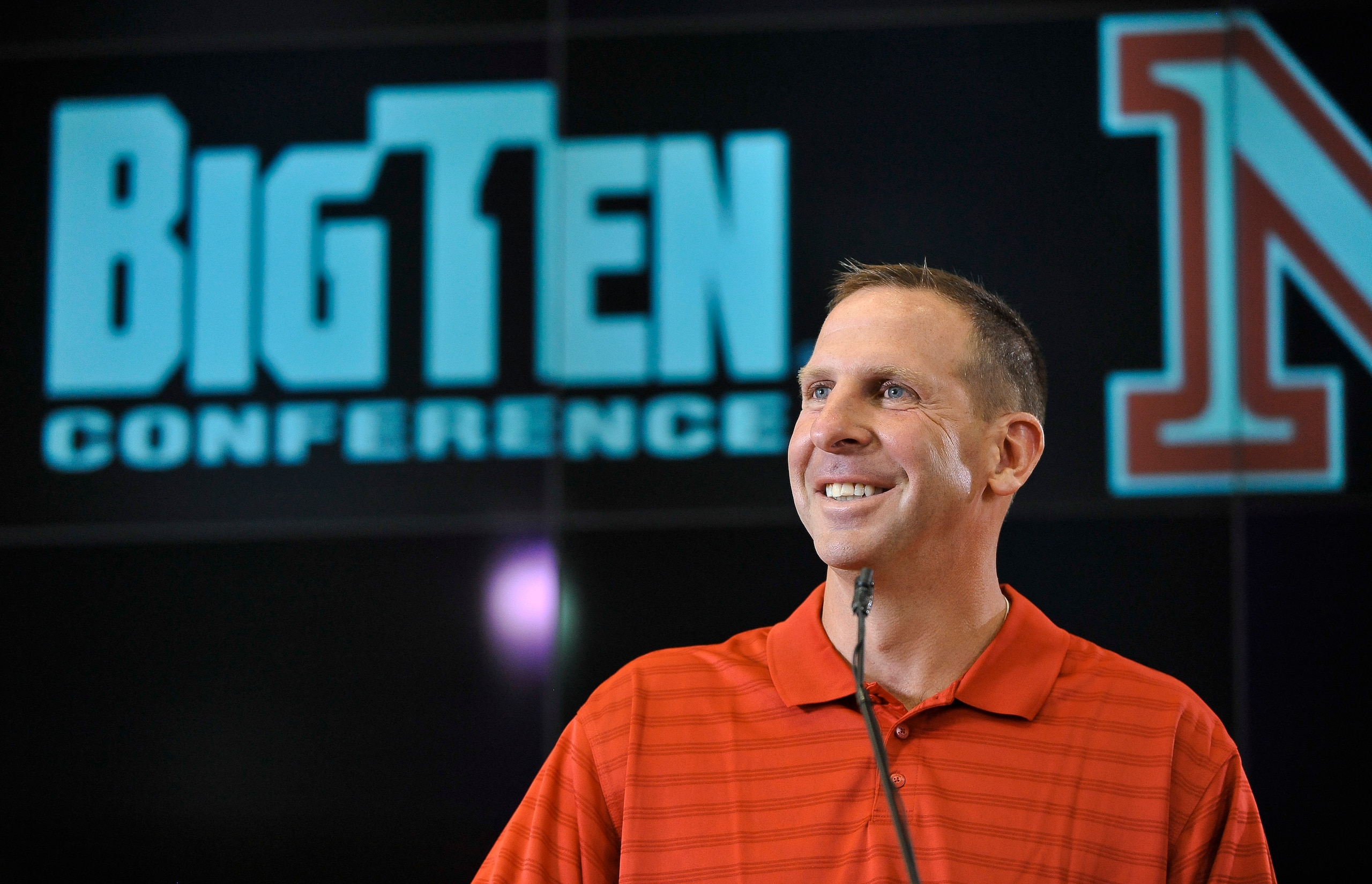 LINCOLN, NE. - JUNE 11:  University of Nebraska football coach Bo Pelini jokes with members of the media at a press conference announcing Nebraska accepting an invitation to join the Big Ten Conference June 11, 2010  in Lincoln, Nebraska.  The university