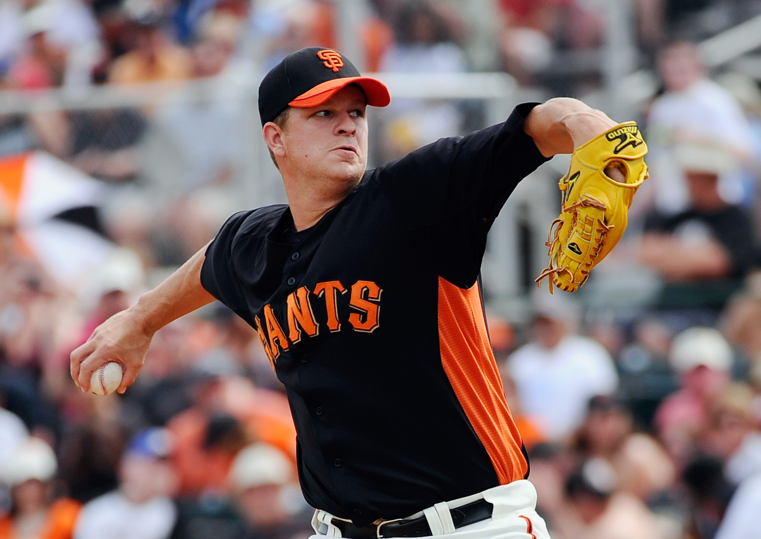 SCOTTSDALE, AZ - MARCH 14:  Matt Cain #18 of the San Francisco Giants throws a pitch against the Milwaukee Brewers during the spring training baseball game at Scottsdale Stadium on March 14, 2011 in Scottsdale, Arizona.  (Photo by Kevork Djansezian/Getty