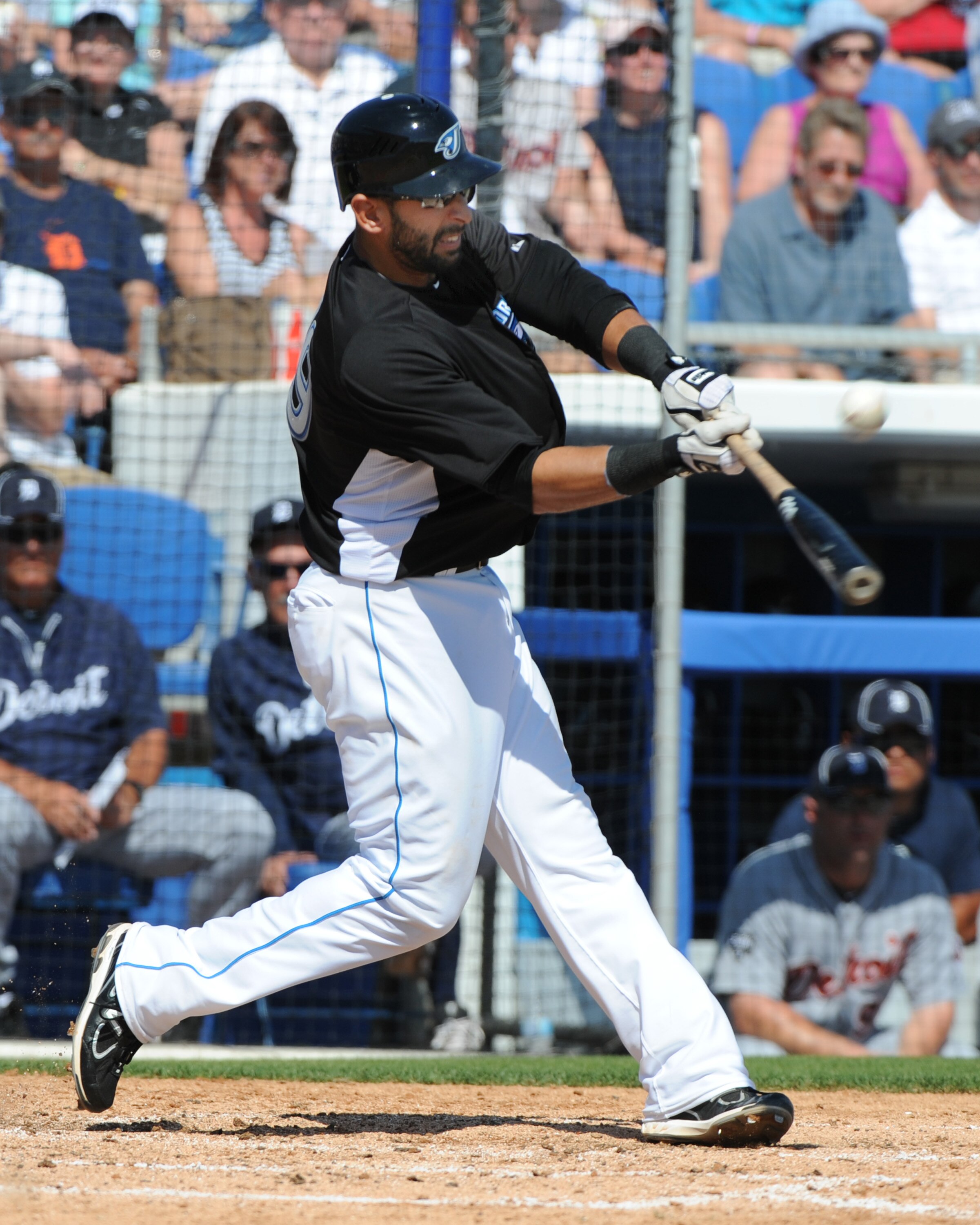 DUNEDIN, FL - FEBRUARY 26:  Infielder Jose Bautista #19 of the Toronto Blue Jays bats against the Detroit Tigers February 26, 2011 at Florida Auto Exchange Stadium in Dunedin, Florida.  (Photo by Al Messerschmidt/Getty Images)