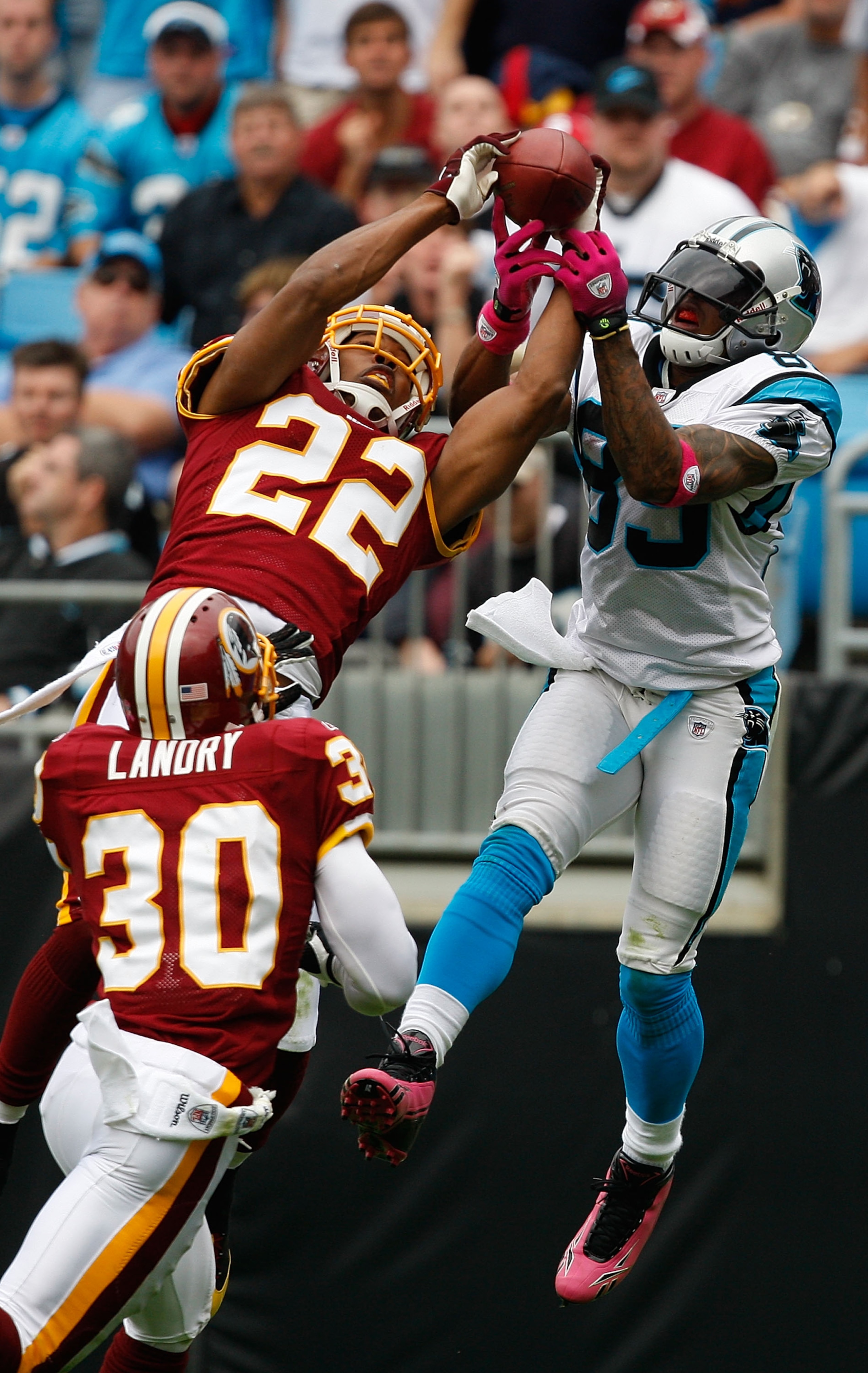 CHARLOTTE, NC - OCTOBER 11:  Steve Smith #89 of the Carolina Panthers has a pass broken up by Carlos Rogers #22 of the Washington Redskins at Bank of America Stadium on October 11, 2009 in Charlotte, North Carolina.  (Photo by Streeter Lecka/Getty Images)