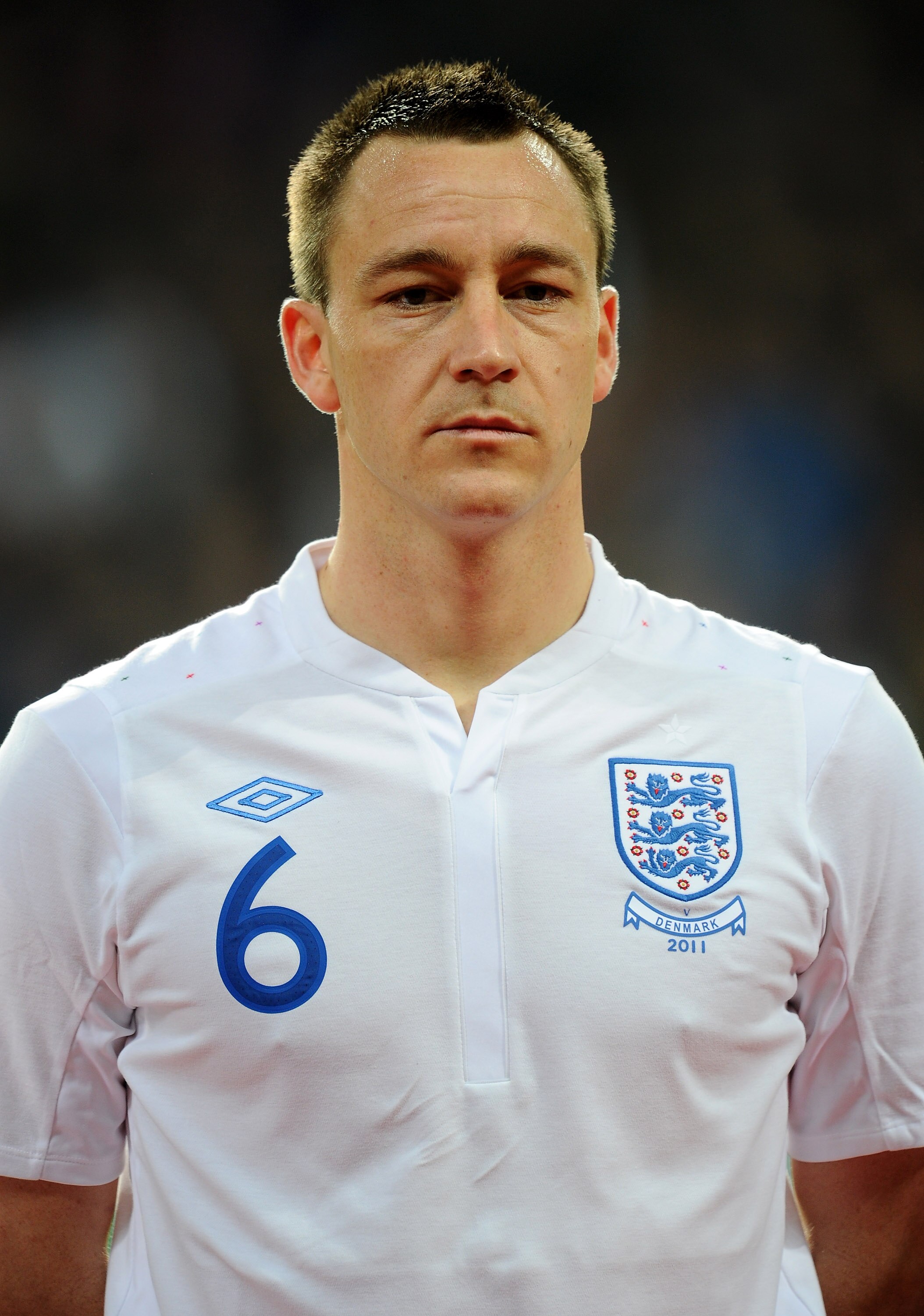COPENHAGEN, DENMARK - FEBRUARY 09:  John Terry of England stands for the national anthems prior to the International Friendly match between Denmark and England at Parken Stadium on February 9, 2011 in Copenhagen, Denmark.  (Photo by Mike Hewitt/Getty Imag