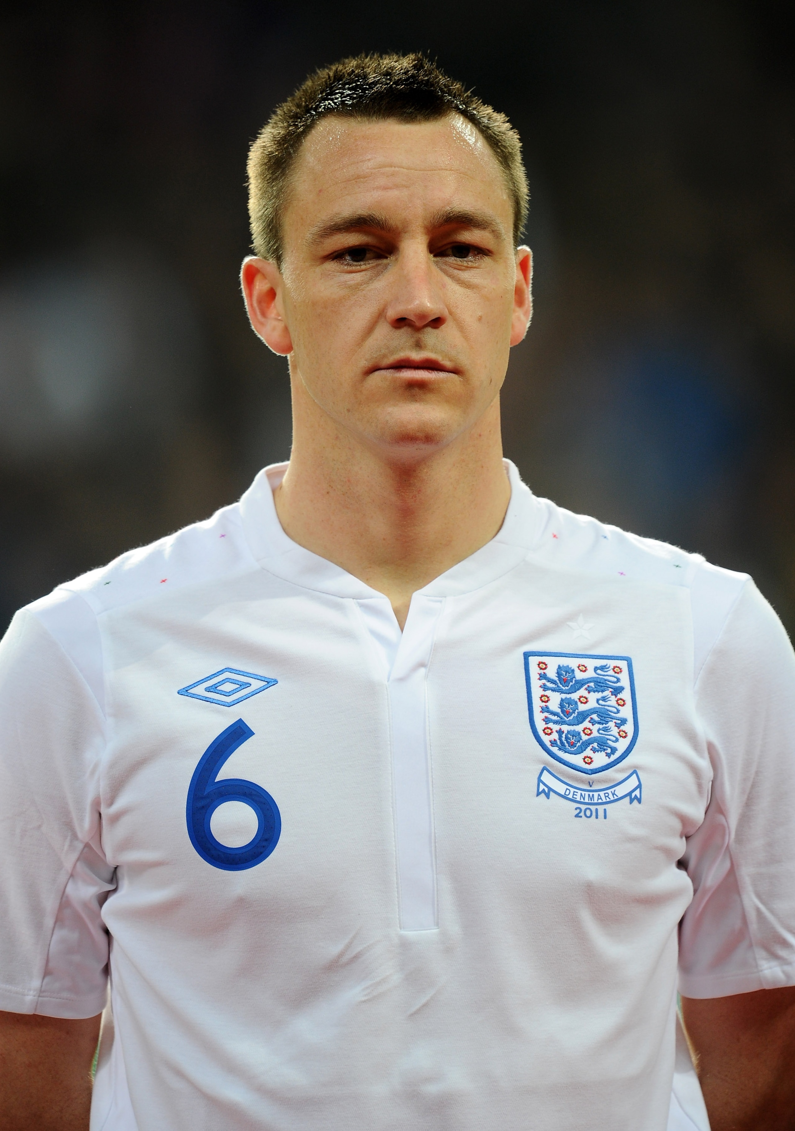 COPENHAGEN, DENMARK - FEBRUARY 09:  John Terry of England stands for the national anthems prior to the International Friendly match between Denmark and England at Parken Stadium on February 9, 2011 in Copenhagen, Denmark.  (Photo by Mike Hewitt/Getty Imag