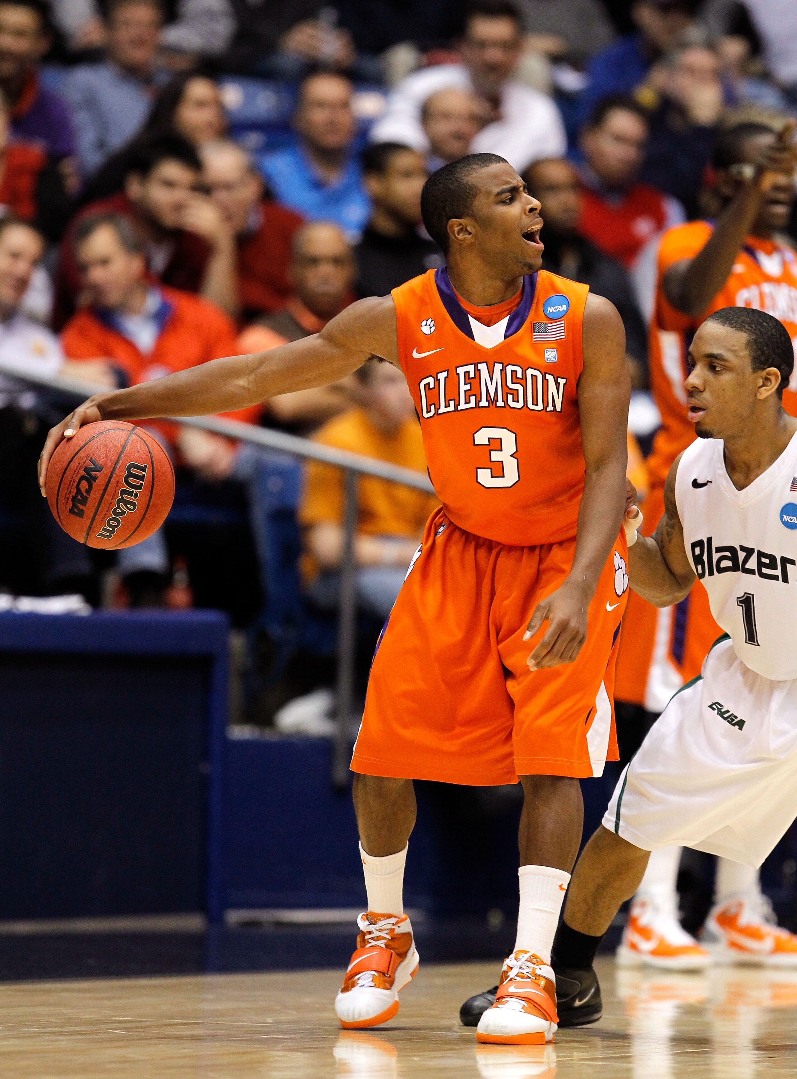 DAYTON, OH - MARCH 15: Zavier Anderson #3 of the Clemson Tigers handles the ball agaisnt Aaron Johnson #1 of the UAB Blazers during the first round of the 2011 NCAA men's basketball tournament at UD Arena on March 15, 2011 in Dayton, Ohio. (Photo by Greg DAYTON, OH - MARCH 15: Zavier Anderson #3 of the Clemson Tigers handles the ball agaisnt Aaron Johnson #1 of the UAB Blazers during the first round of the 2011 NCAA men's basketball tournament at UD Arena on March 15, 2011 in Dayton, Ohio. (Photo by Greg