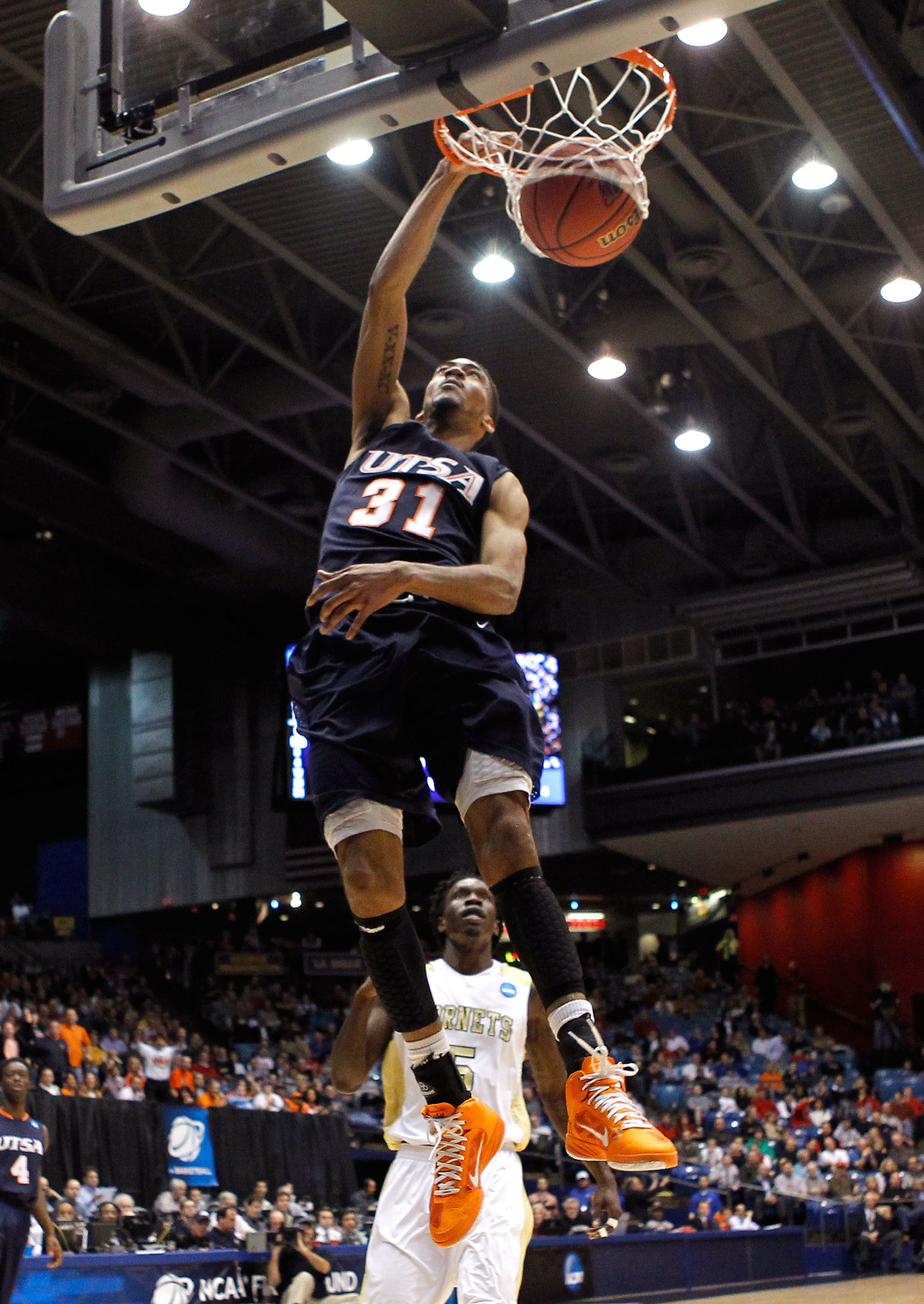 DAYTON, OH - MARCH 16:  Melvin Johnson III #31 of the Texas-San Antonio Roadrunners dunks the ball against the Alabama State Hornets during the first round of the 2011 NCAA men's basketball tournament at UD Arena on March 16, 2011 in Dayton, Ohio.  (Photo