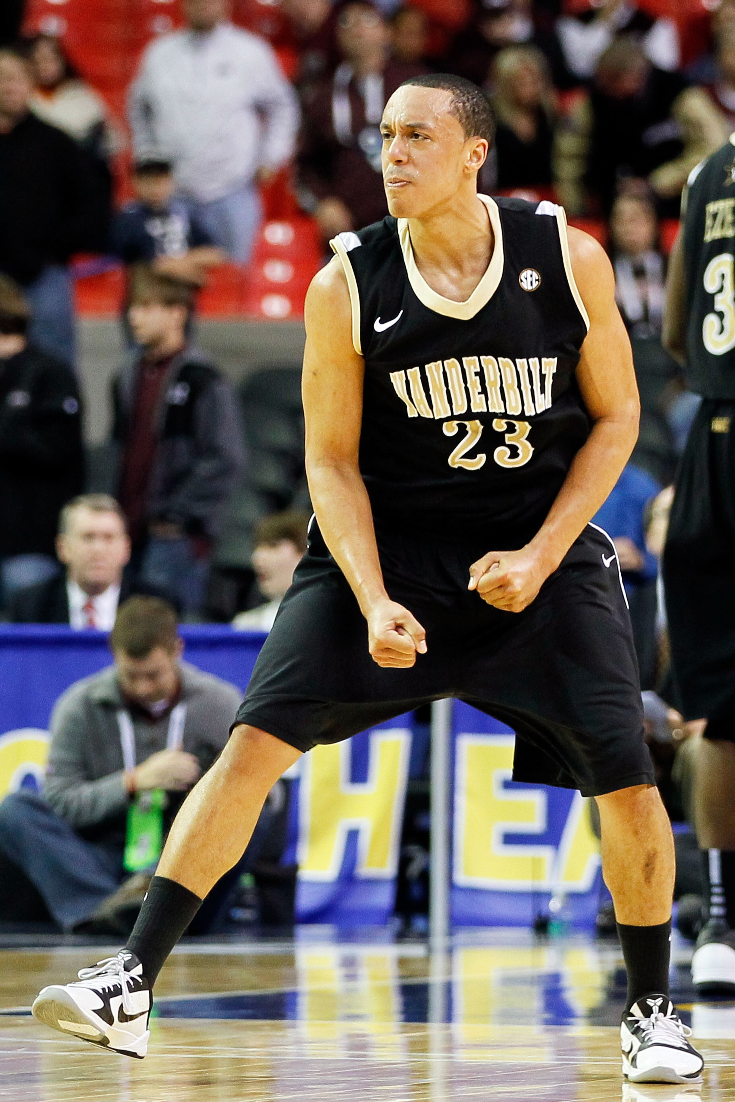 ATLANTA, GA - MARCH 11: John Jenkins #23 of the Vanderbilt Commodores celebrates their win over the Mississippi State Bulldogs during the quarterfinals of the SEC Men's Basketball Tournament at Georgia Dome on March 11, 2011 in Atlanta, Georgia. The Comm ATLANTA, GA - MARCH 11: John Jenkins #23 of the Vanderbilt Commodores celebrates their win over the Mississippi State Bulldogs during the quarterfinals of the SEC Men's Basketball Tournament at Georgia Dome on March 11, 2011 in Atlanta, Georgia. The Comm