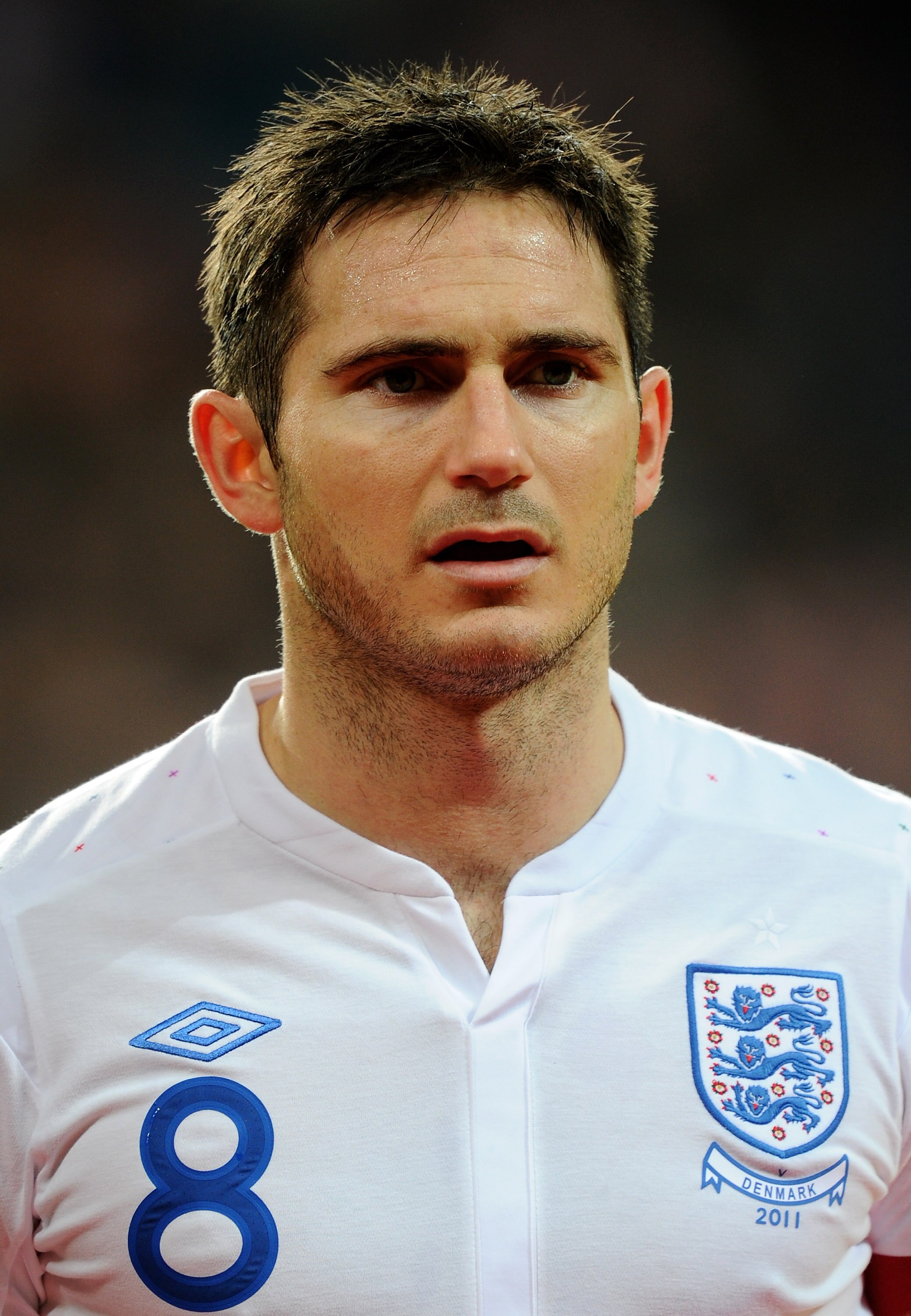 COPENHAGEN, DENMARK - FEBRUARY 09:  Frank Lampard of England stands for the national anthems prior to the International Friendly match between Denmark and England at Parken Stadium on February 9, 2011 in Copenhagen, Denmark.  (Photo by Mike Hewitt/Getty I