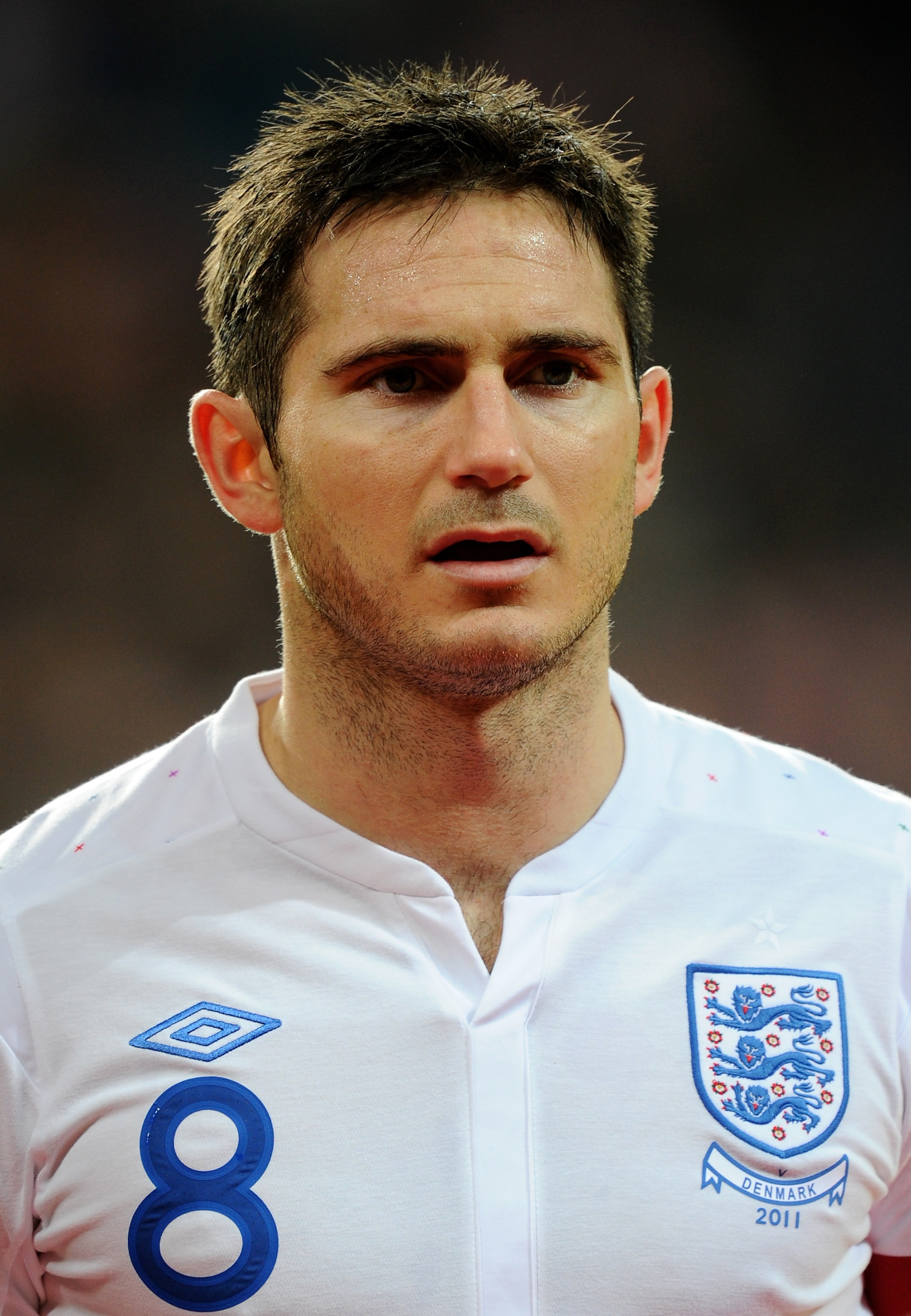 COPENHAGEN, DENMARK - FEBRUARY 09:  Frank Lampard of England stands for the national anthems prior to the International Friendly match between Denmark and England at Parken Stadium on February 9, 2011 in Copenhagen, Denmark.  (Photo by Mike Hewitt/Getty I