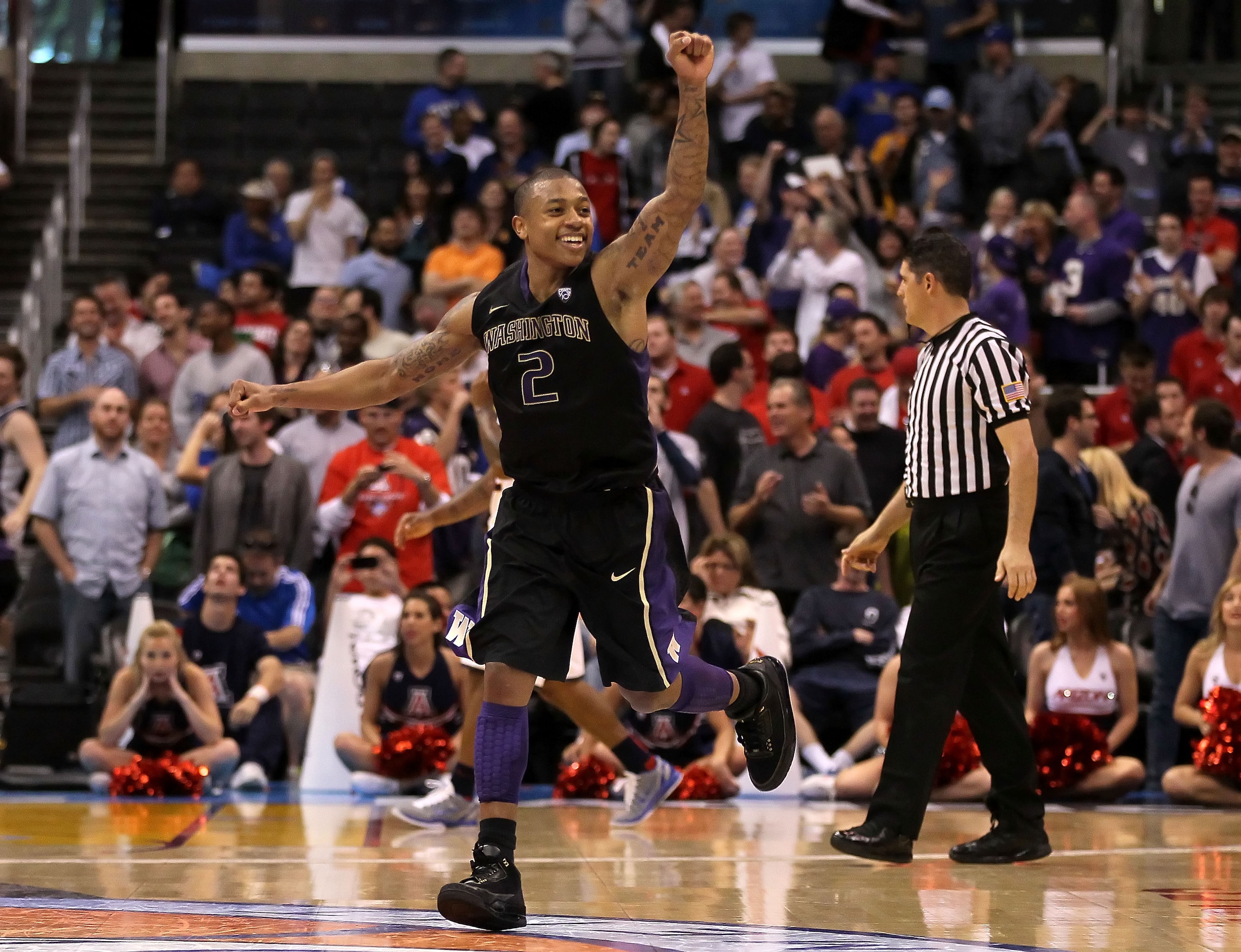 LOS ANGELES, CA - MARCH 12: Isaiah Thomas #2 of the Washington Huskies reacts as the Arizona Wildcats miss a buzzer shot and the game goes into overtime in the championship game of the 2011 Pacific Life Pac-10 Men's Basketball Tournament at Staples Cente LOS ANGELES, CA - MARCH 12: Isaiah Thomas #2 of the Washington Huskies reacts as the Arizona Wildcats miss a buzzer shot and the game goes into overtime in the championship game of the 2011 Pacific Life Pac-10 Men's Basketball Tournament at Staples Cente