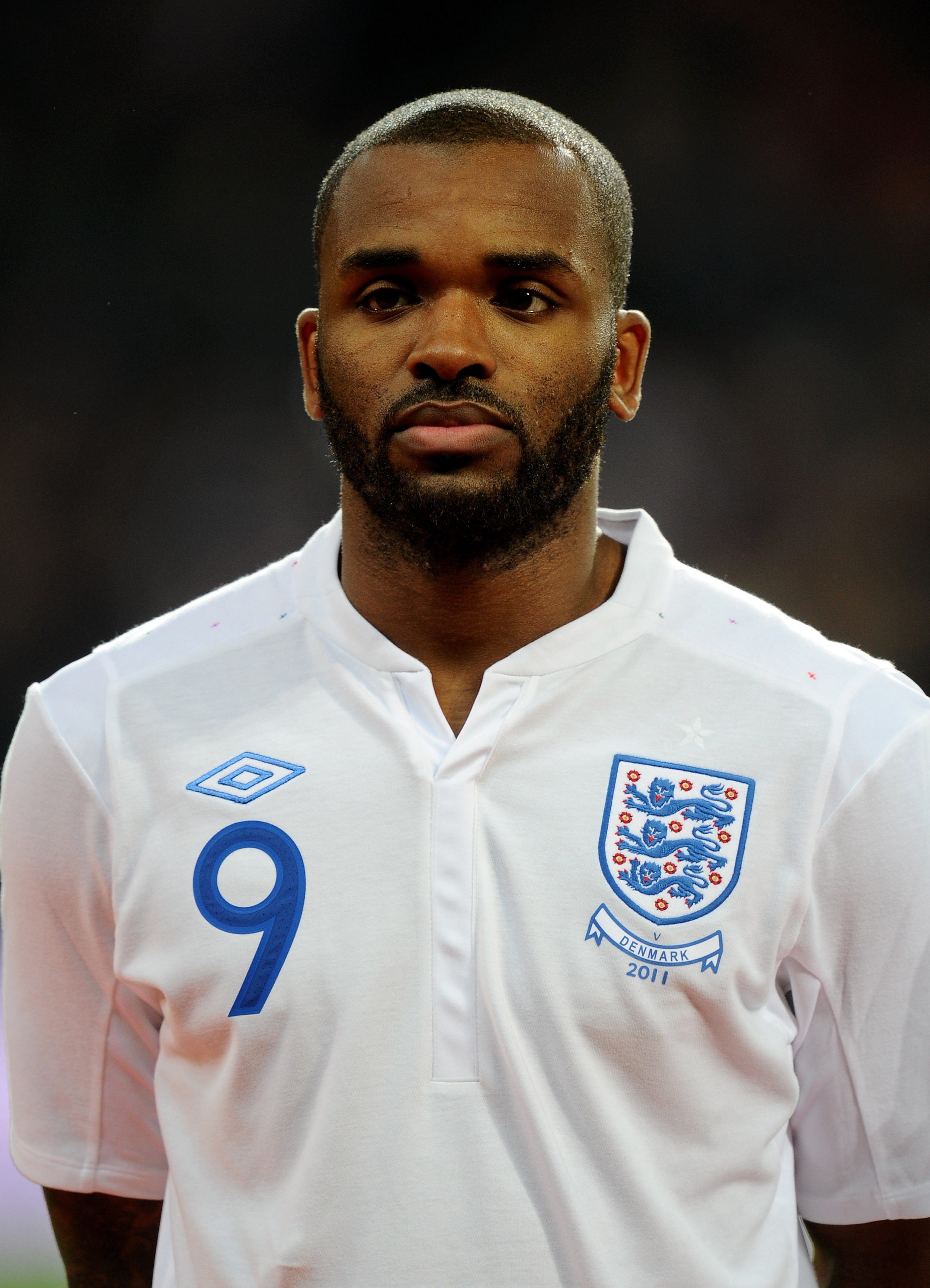 COPENHAGEN, DENMARK - FEBRUARY 09:  Darren Bent of England stands for the national anthems prior to the International Friendly match between Denmark and England at Parken Stadium on February 9, 2011 in Copenhagen, Denmark.  (Photo by Mike Hewitt/Getty Ima