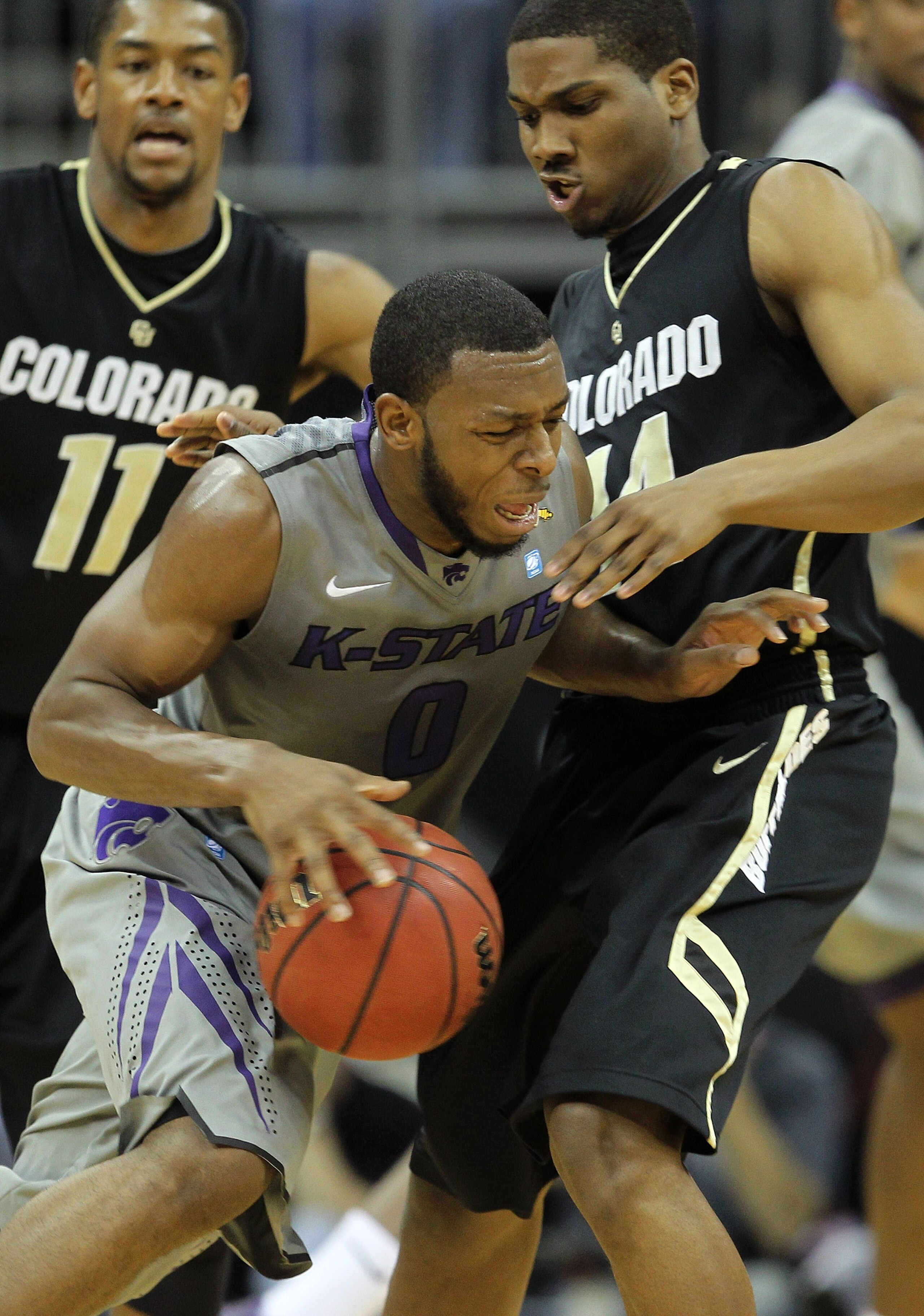 KANSAS CITY, MO - MARCH 10:  Jacob Pullen #0 of the Kansas State Wildcats drives with the ball against the Colorado Buffaloes during their quarterfinal game in the 2011 Phillips 66 Big 12 Men's Basketball Tournament at Sprint Center on March 10, 2011 in K