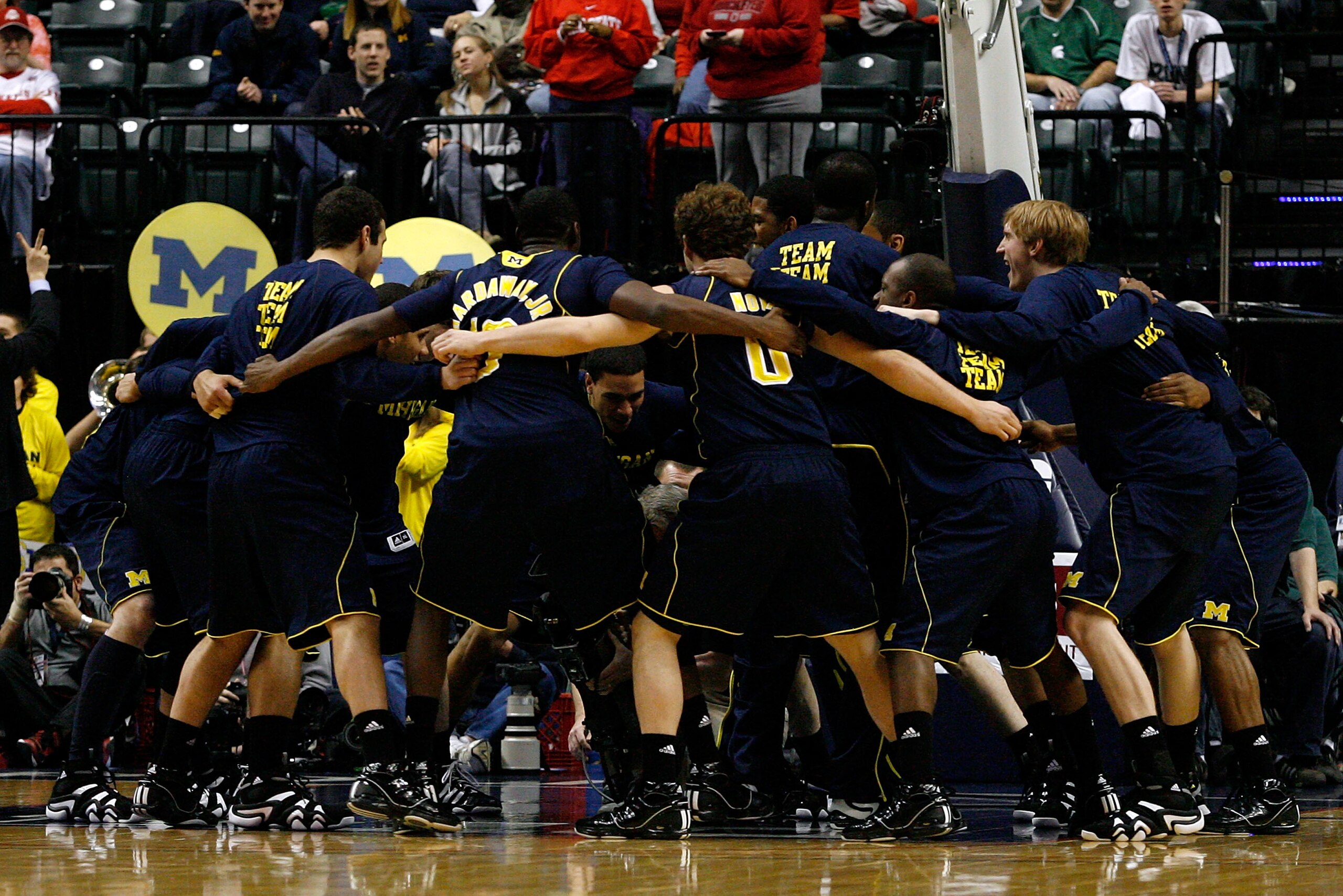 INDIANAPOLIS, IN - MARCH 12:  The Michigan Wolverines huddle prior to playing against the Ohio State Buckeyes during the semifinals of the 2011 Big Ten Men's Basketball Tournament at Conseco Fieldhouse on March 12, 2011 in Indianapolis, Indiana. Ohio Stat