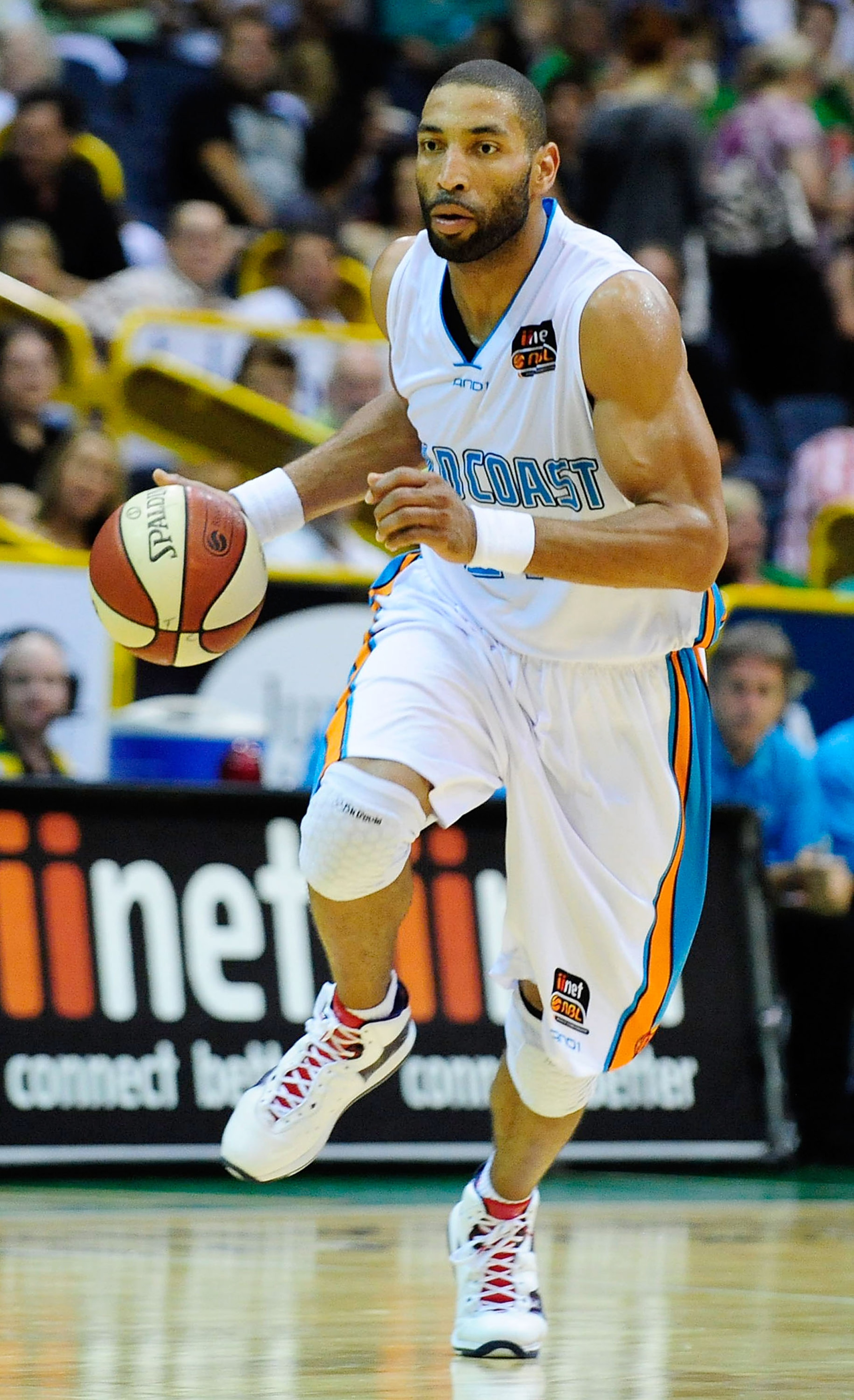 TOWNSVILLE, AUSTRALIA - JANUARY 28:  Ira Clark of the Blaze dribbles the ball during the round 16 NBL match between the Townsville Crocodiles and the Gold Coast Blaze at Townsville Entertainment Centre on January 28, 2011 in Townsville, Australia.  (Photo