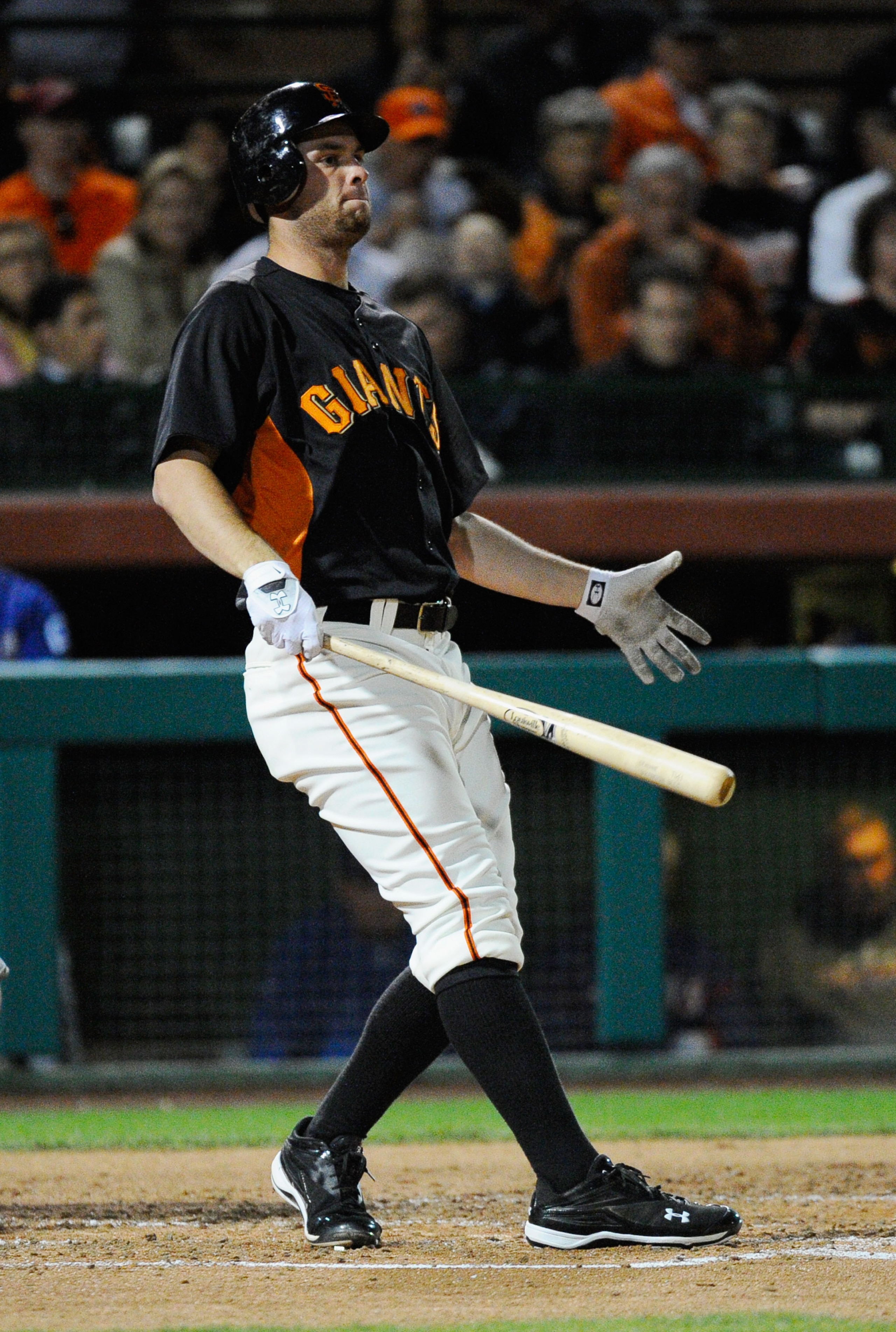 SCOTTSDALE, AZ - MARCH 07:  Brandon Belt #9 of the San Francisco Giants swings the bat against the Texas Rangers during the exhibition baseball game in the first meeting between the two teams since the World Series at Scottsdale Stadium on March 7, 2011 i