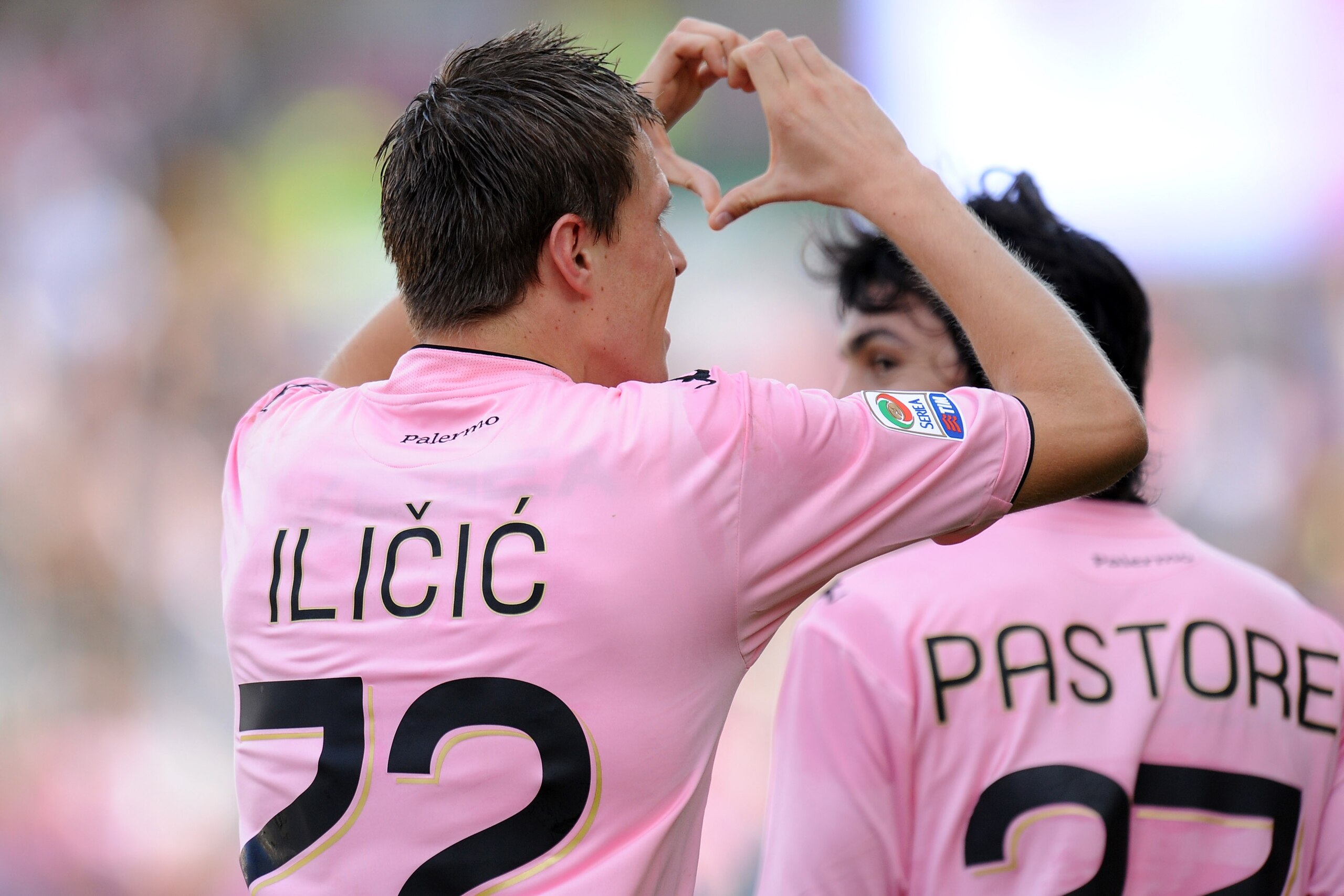 PALERMO, ITALY - OCTOBER 17:  Josip Ilicic (L) of Palermo celebrates his team's second goal as his team mate Javier Pastore (R) looks on during the Serie A match between US Citta di Palermo and Bologna FC at Stadio Renzo Barbera on October 17, 2010 in Pal