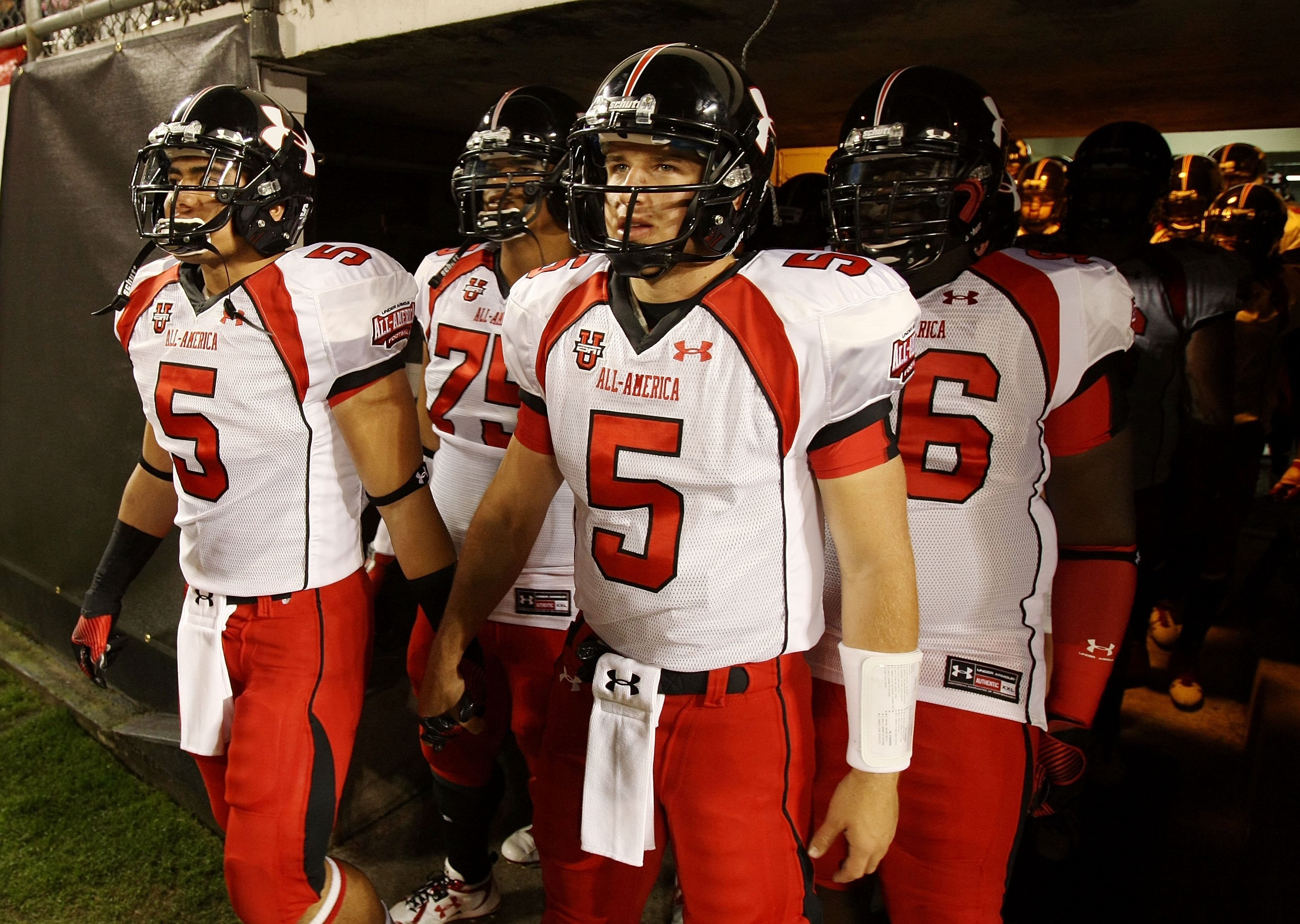 ORLANDO, FL - JANUARY 04:  Matt Barkley #5 and linebacker Manti Teo #5, L, of the white team lead their team onto the field before the All America Under Armour Football Game at Florida Citrus Bowl on January 4, 2009 in Orlando, Florida.  (Photo by Doug Be