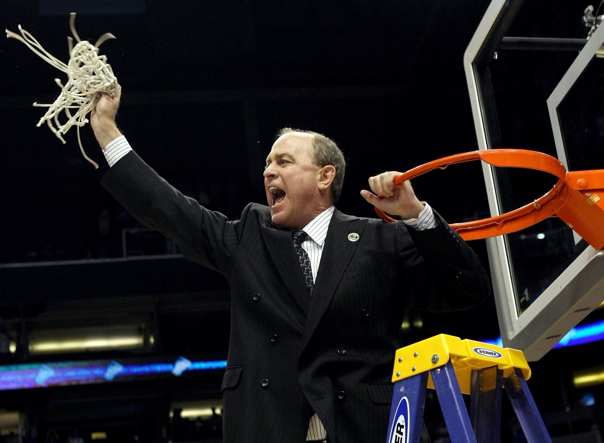 PHOENIX - MARCH 29:  Head coach Ben Howland of the UCLA Bruins celebrates after cutting the net down following his team win over the Xavier Musketeers in the West Regional Final on March 29, 2008 at the U.S. Airways Center in Phoenix, Arizona.  The Bruins